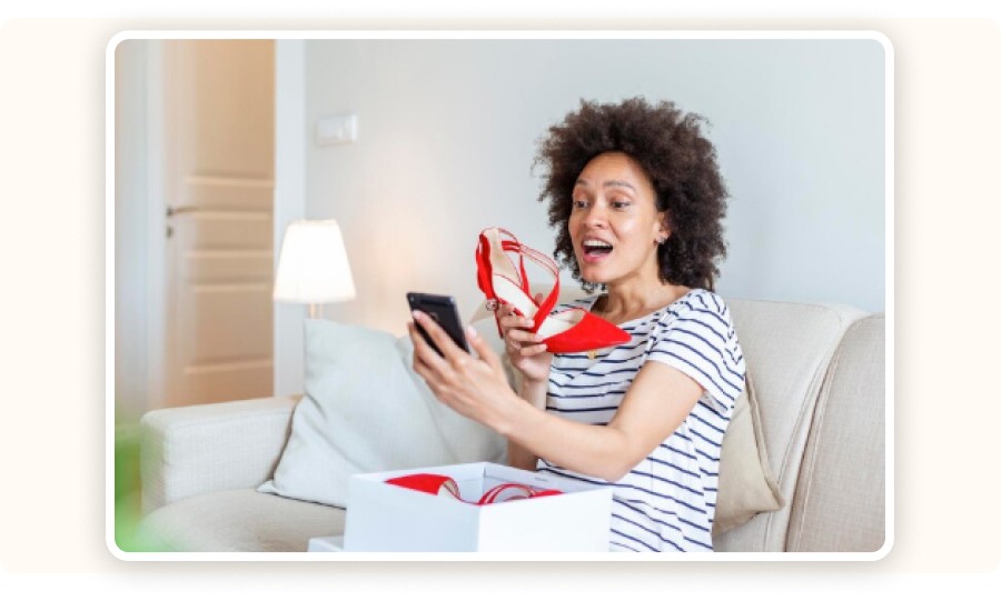 Red shoes in front of smartphone
