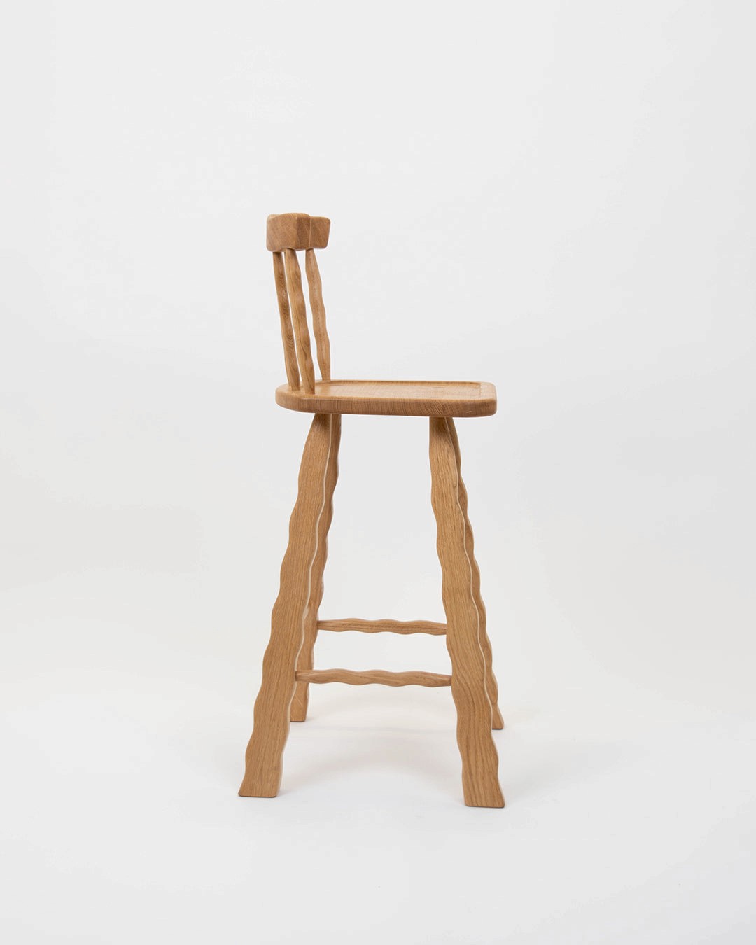 Oak bar stool on a white background