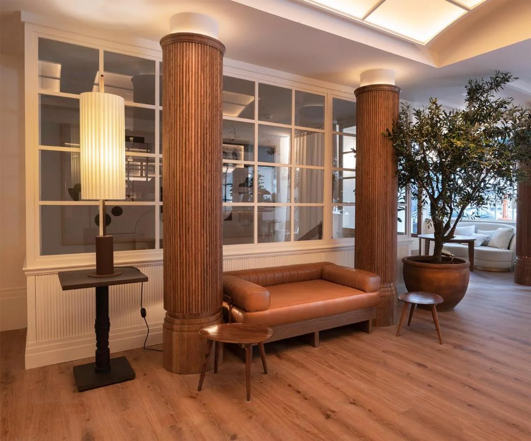 A vintage race car with blue, orange, and white livery