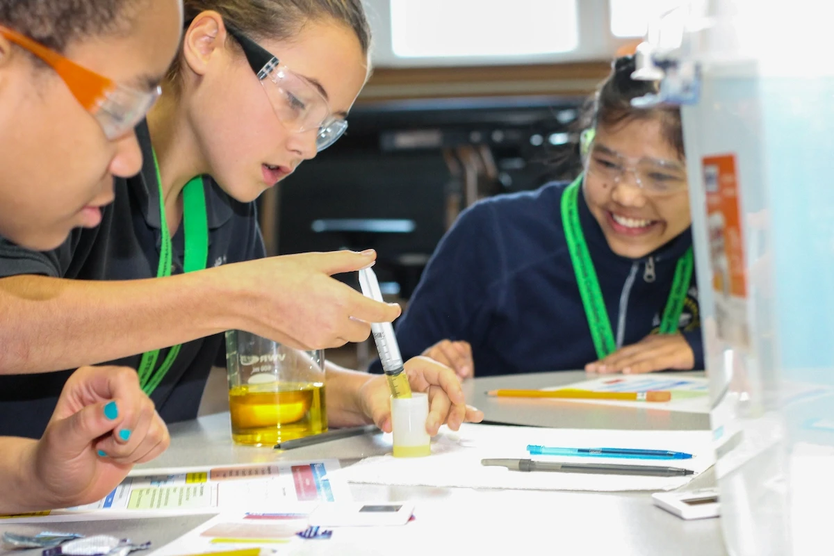 Middle school students at Buffalo Academy of Science engaged in hands-on STEM experiment