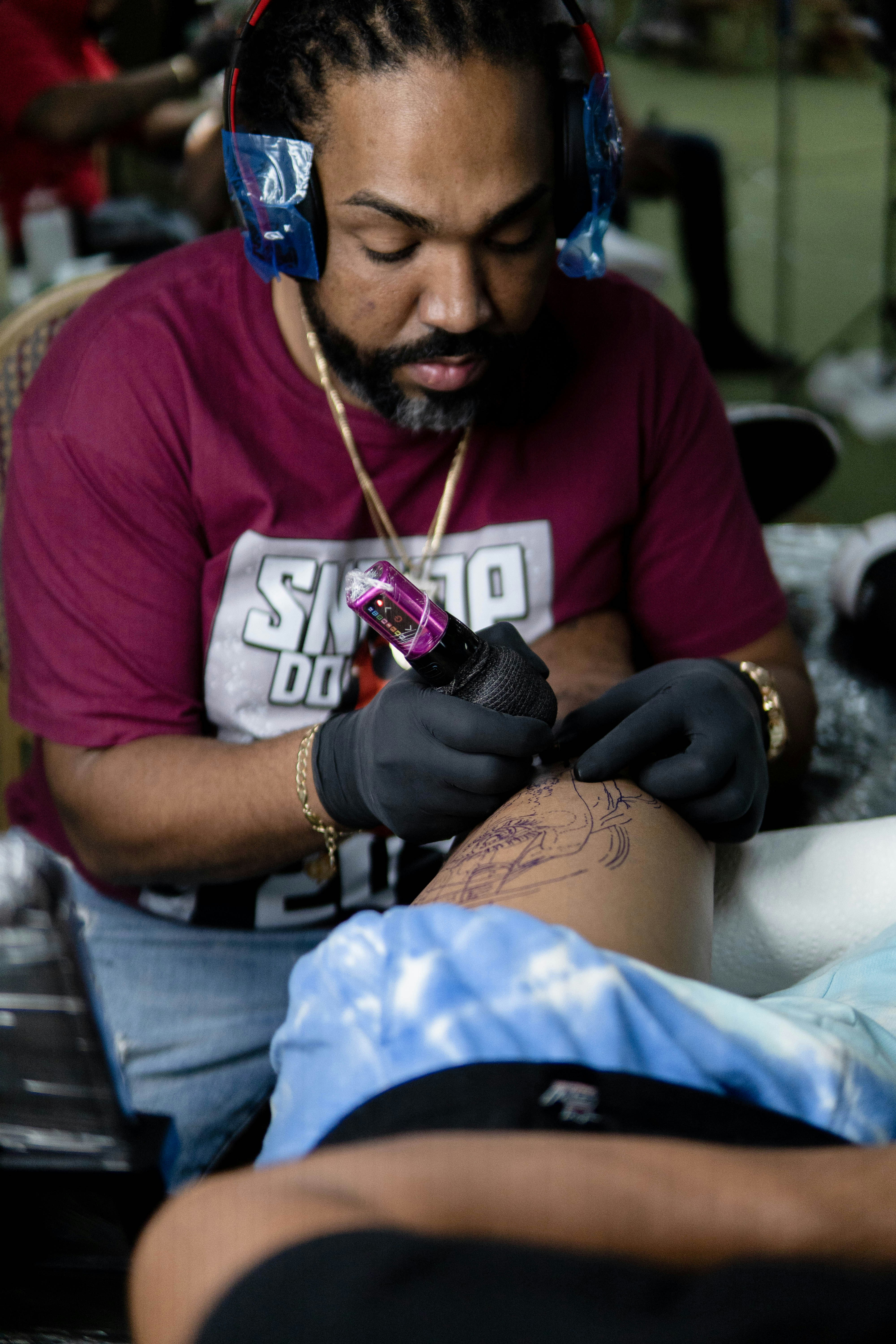 a man with a tattoo on his arm
