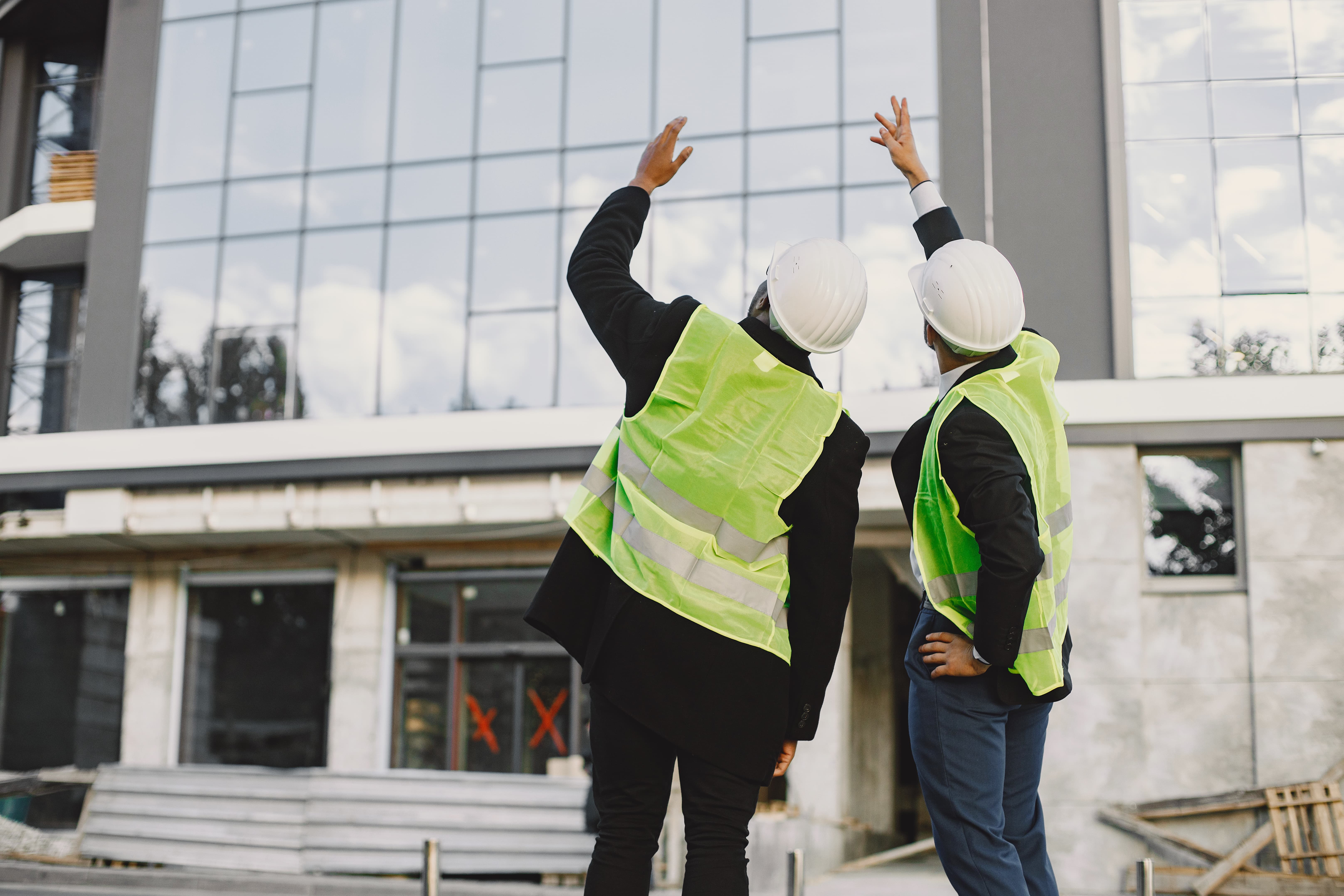Investors standing outside a building