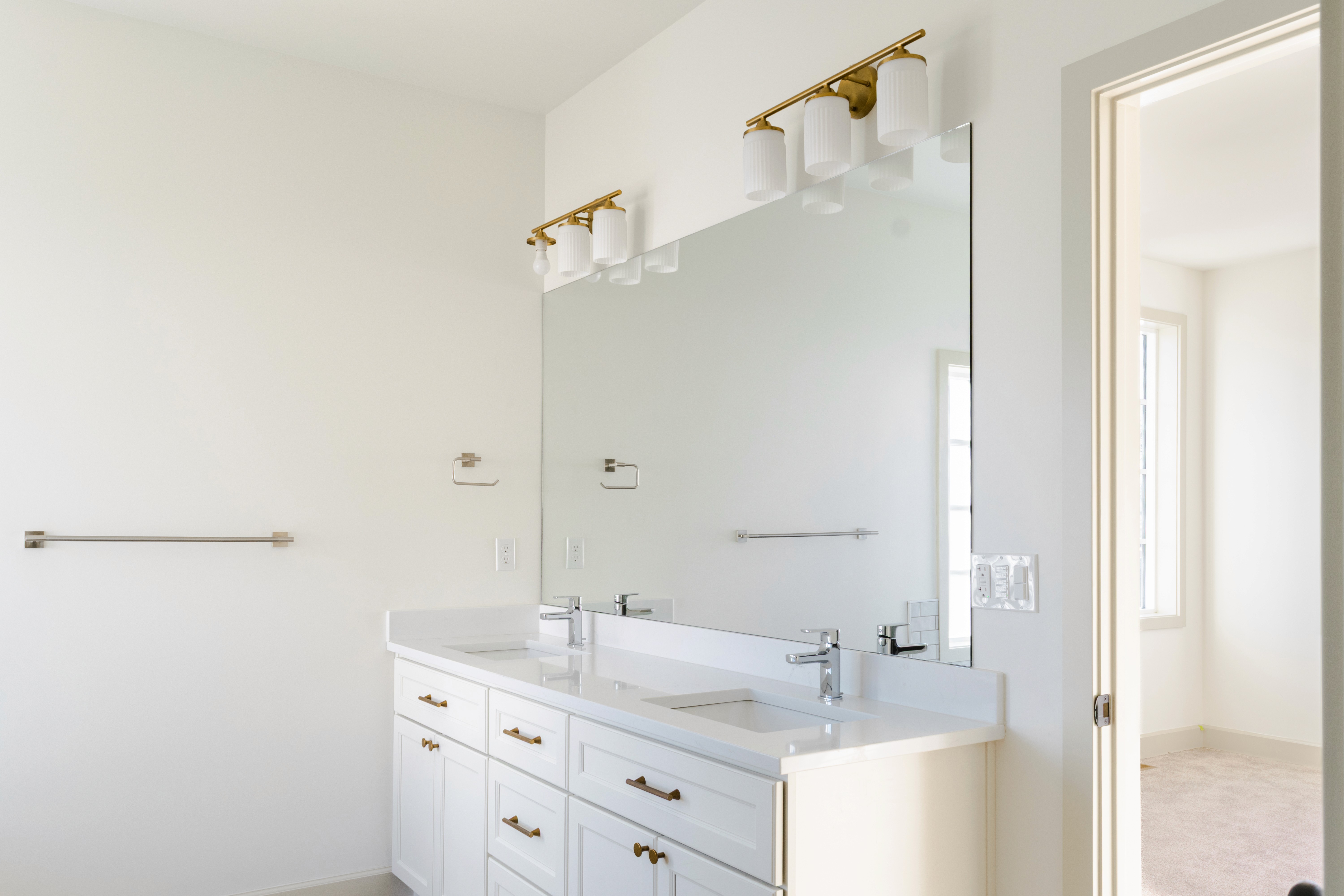 Master bathroom vanity with two sinks.