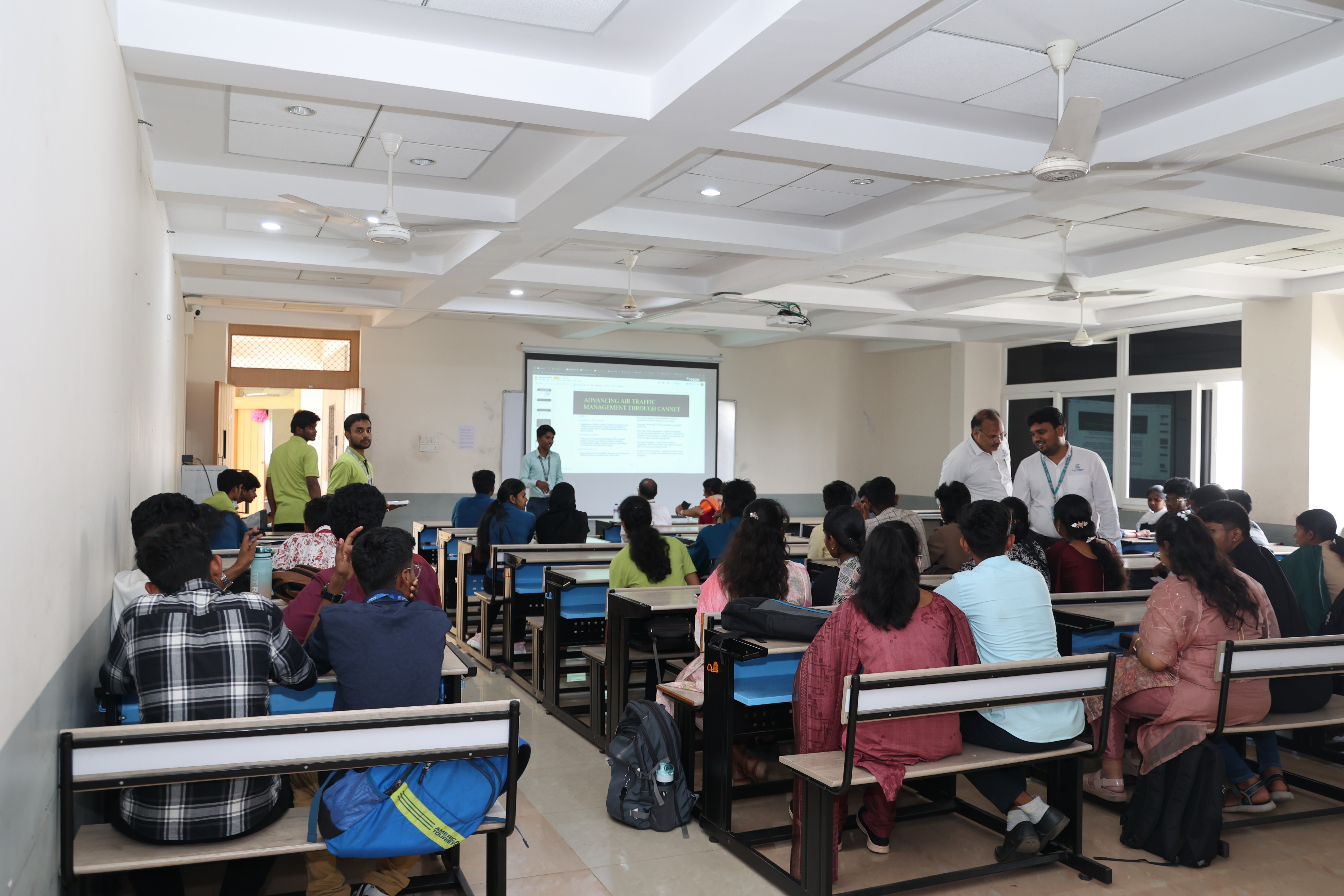 man standing in front of group of men