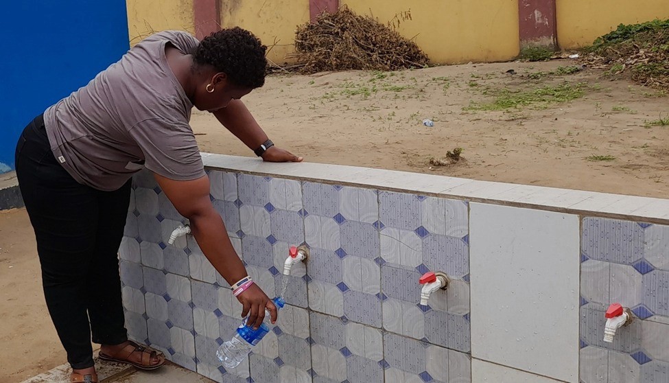 man in white button up shirt holding white smartphone