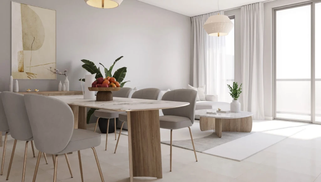 Contemporary living room with white furnishings and a large window, reflecting the chic atmosphere of Terrazzo Residences.