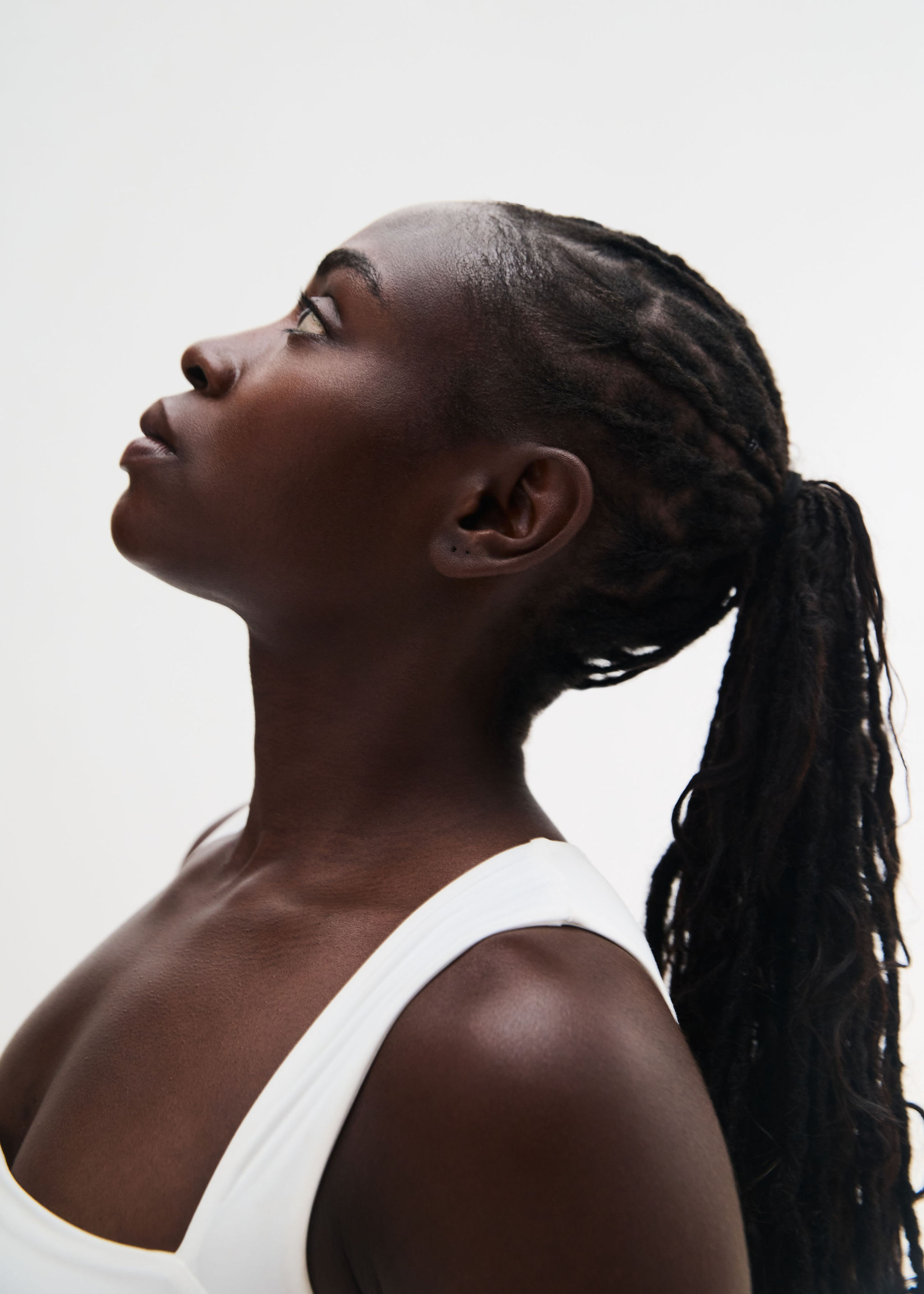 Arches and columns in a sunlit building interior