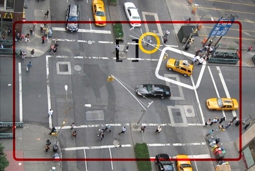 street junction with white and red artsy outlines around cars