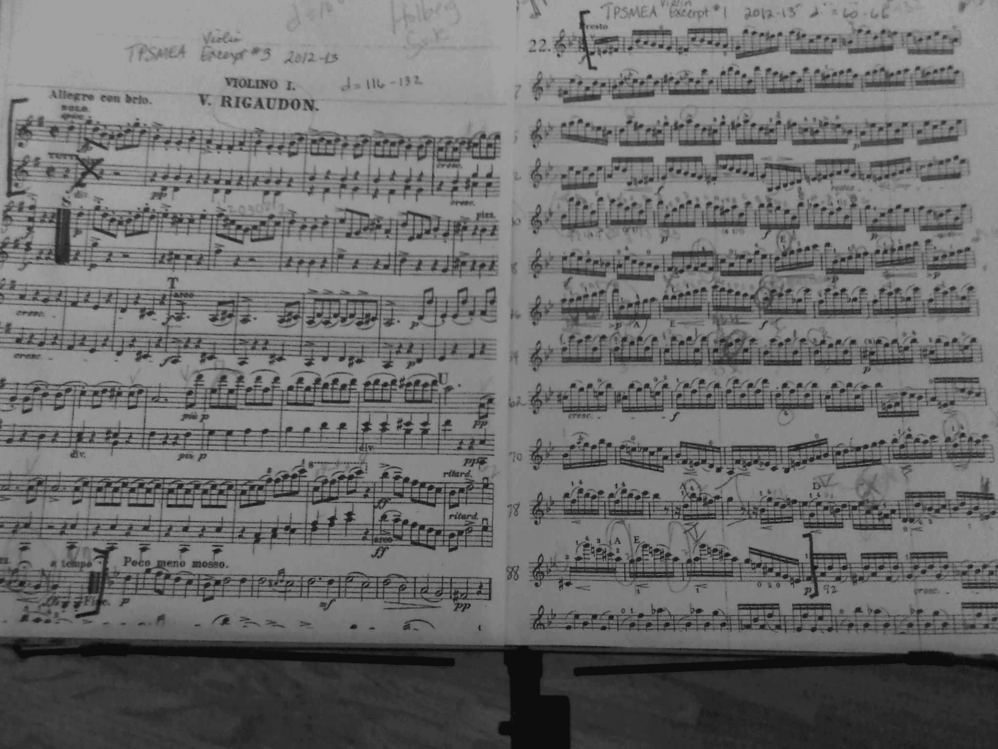 a white car parked in front of a building