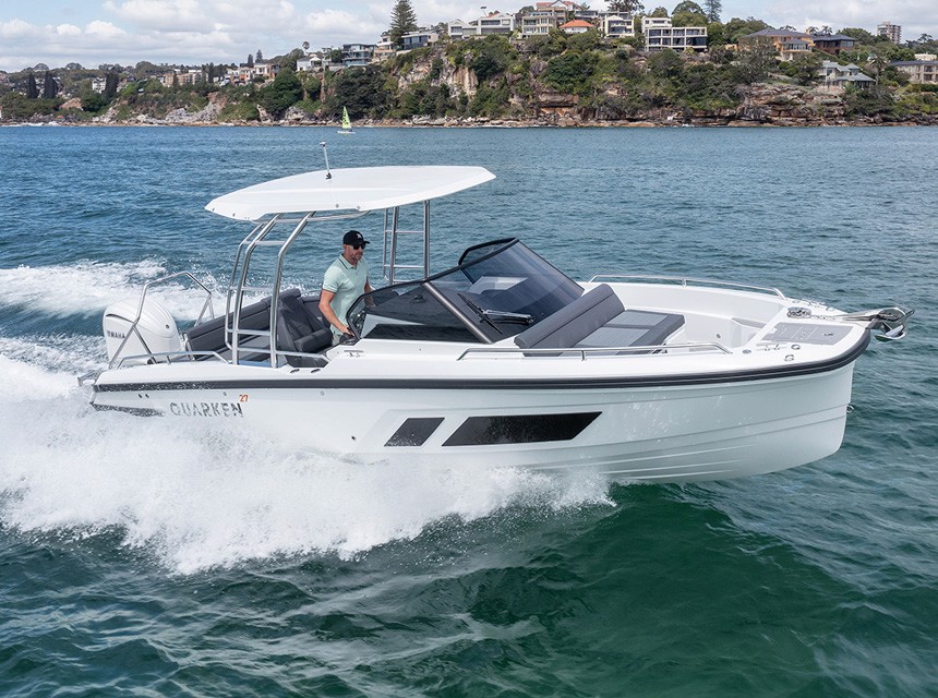 A boat Quarken 27 T-Top moving fast in the sea