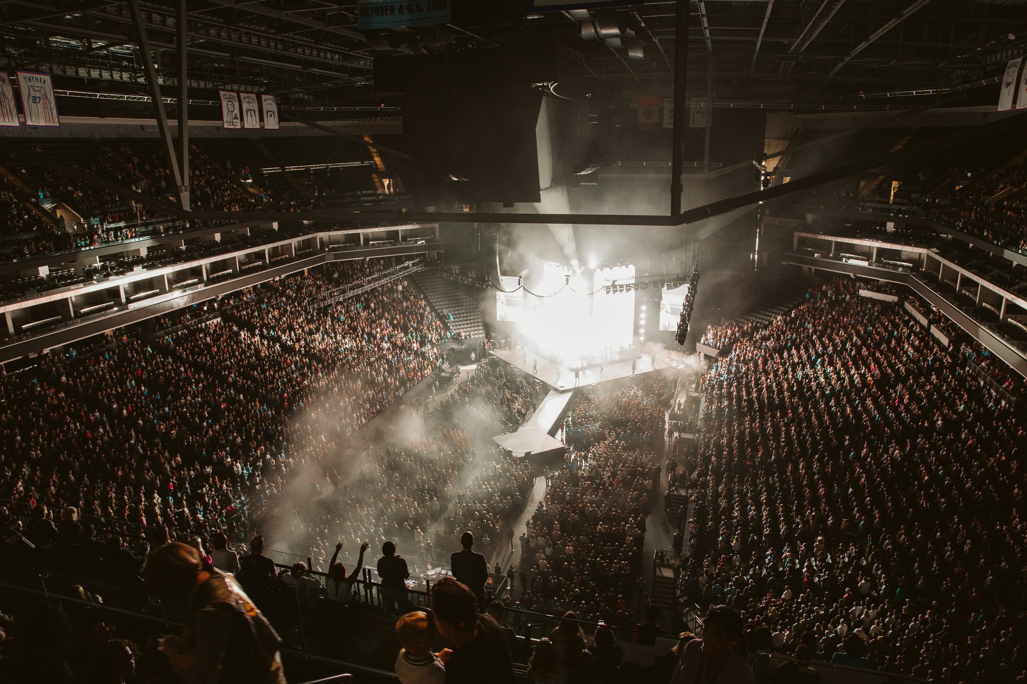 kids lying on a glass land and smiling