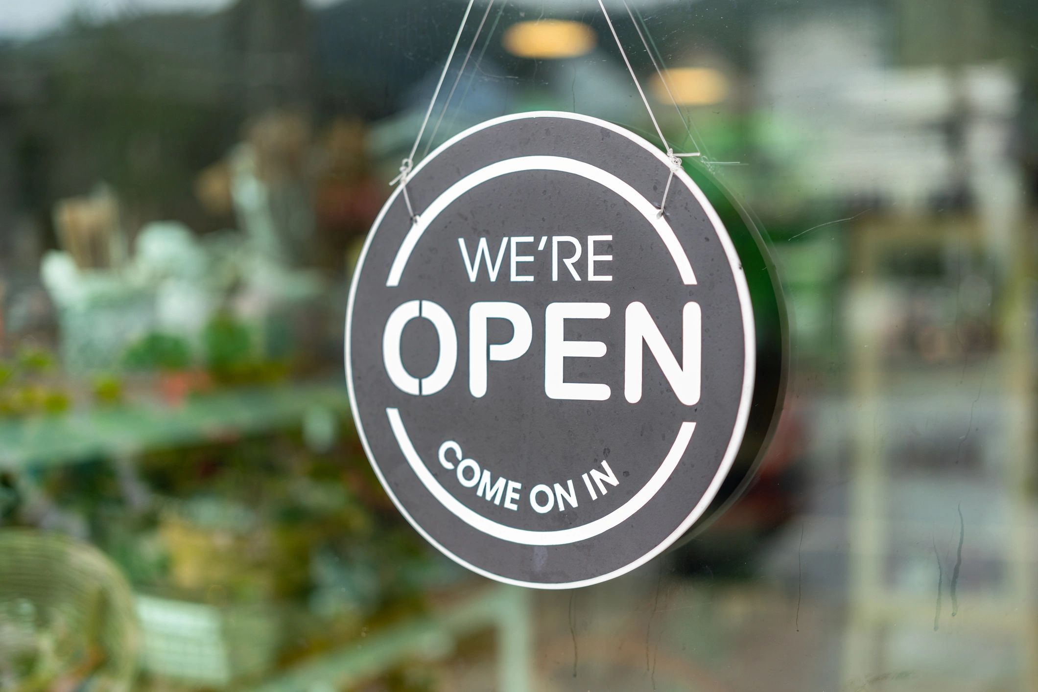 a black and white living room with a large tv