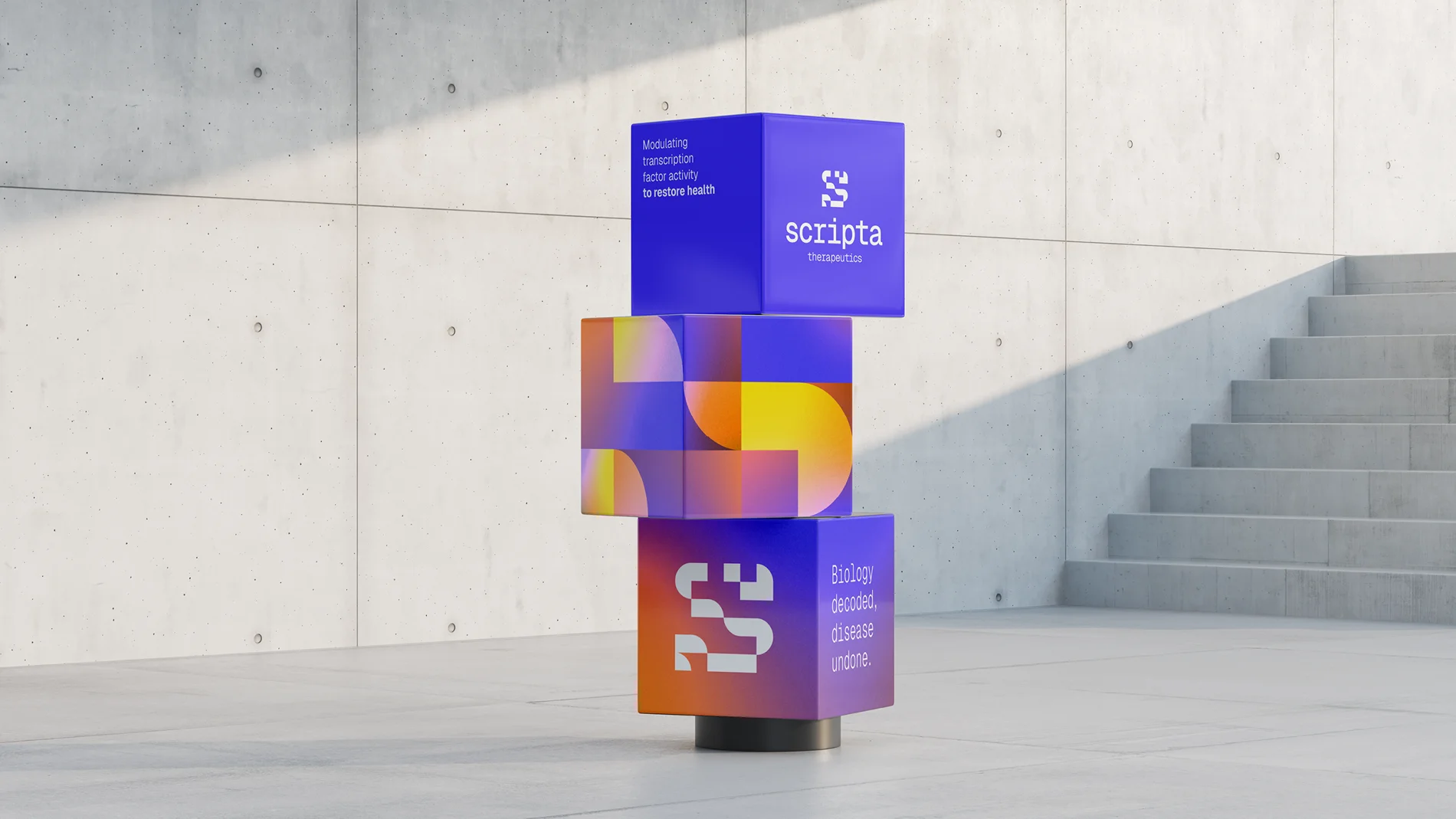 Tall installation of stacked cubes in a modern public space, each cube featuring Scripta’s geometric brand design, logo, and key messaging in a purple and orange gradient.