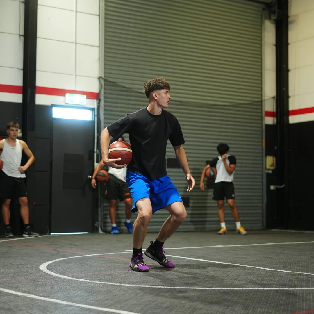 Coach Jorgos leading a skills session at a Free Flow Basketball training session.