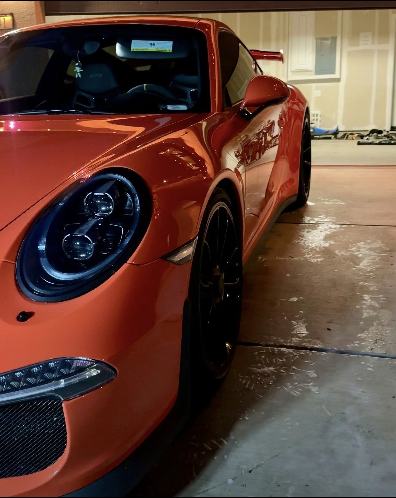 Porsche after a full exterior detail with glossy paint and clean wheels