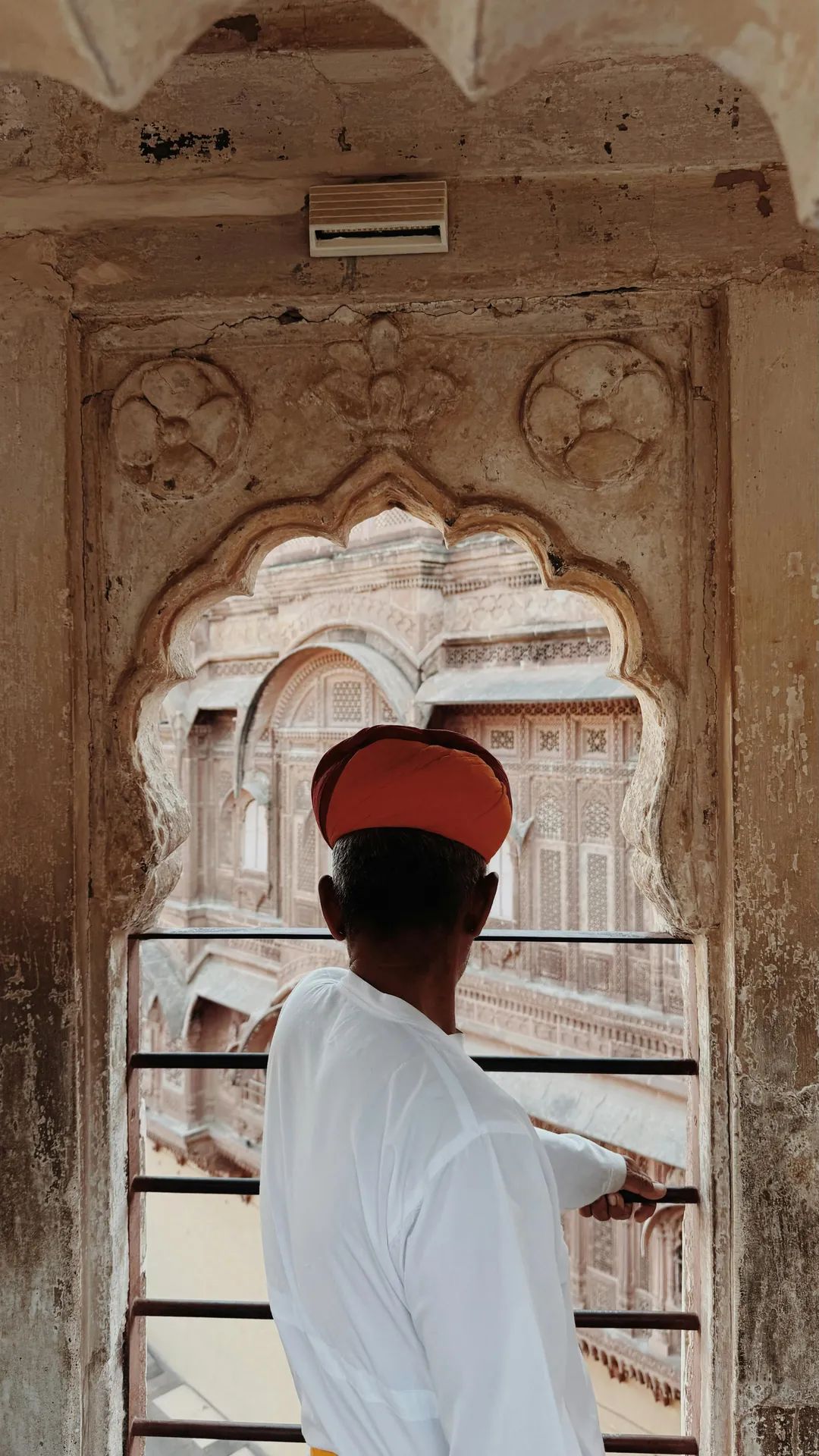 a black and white living room with a large tv