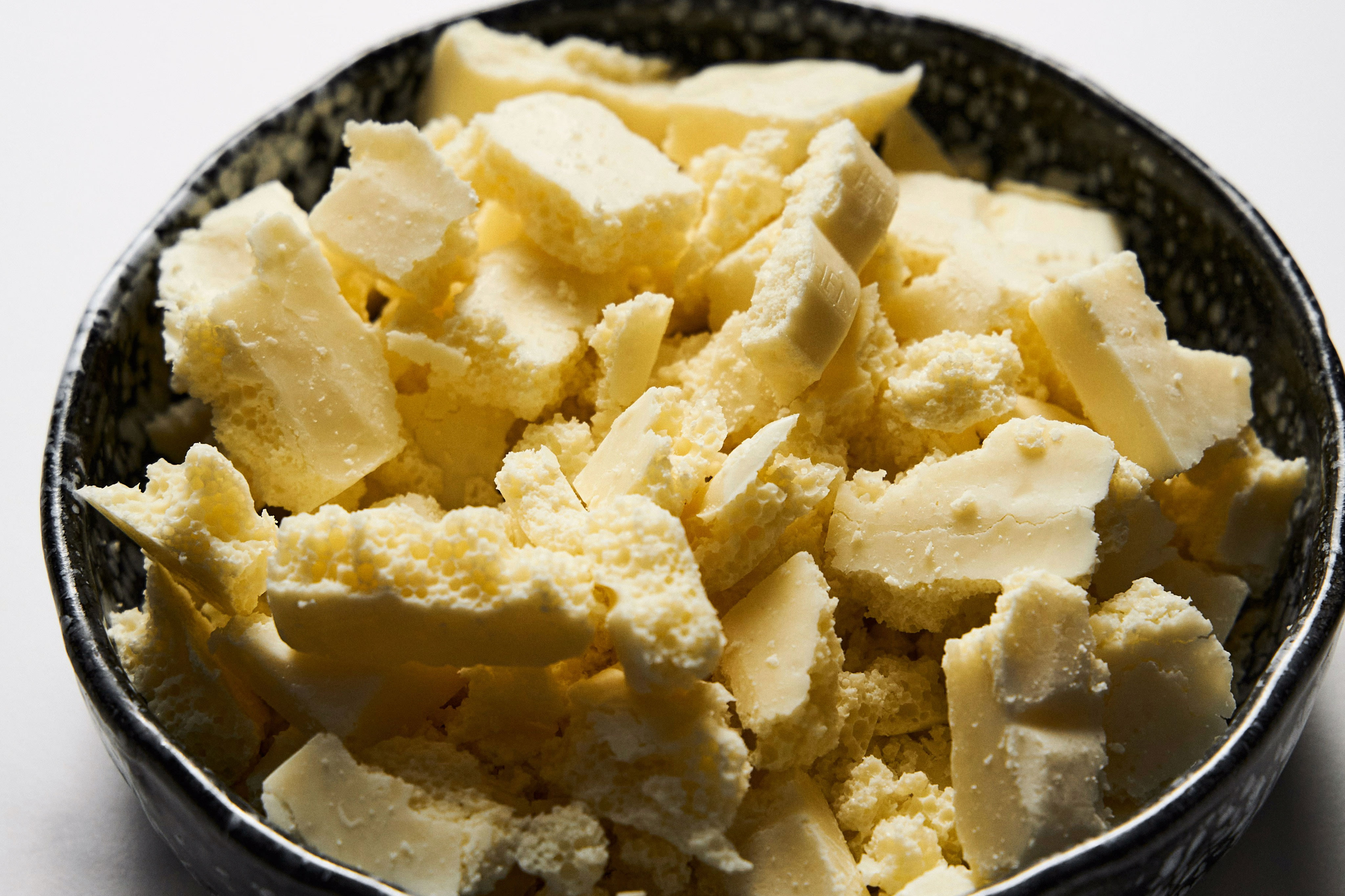 a bowl of food that is on a table