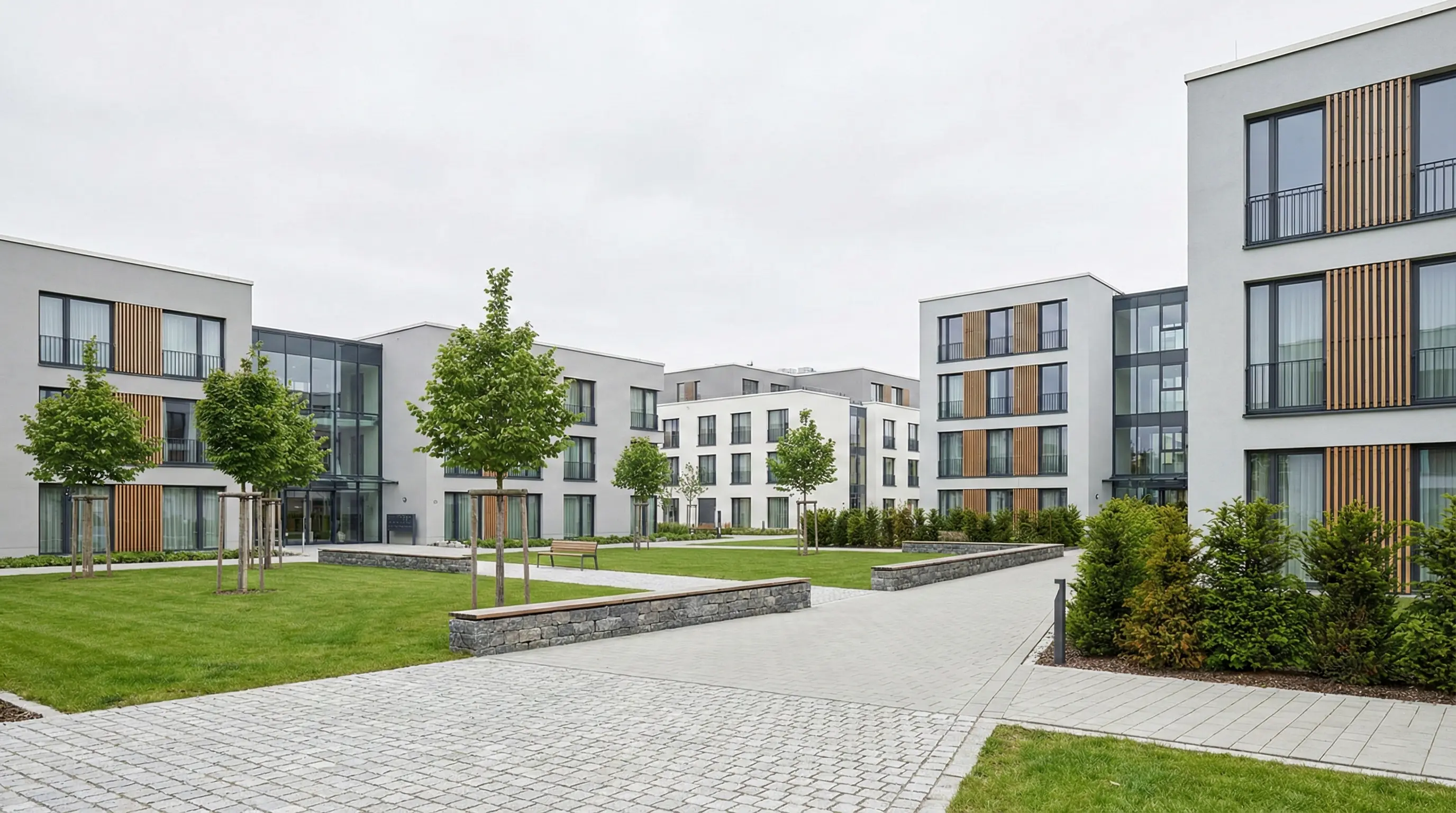 Modernes mehrgeschossiges Neubauquartier mit Innenhof – Servicewohnen & Tagespflege