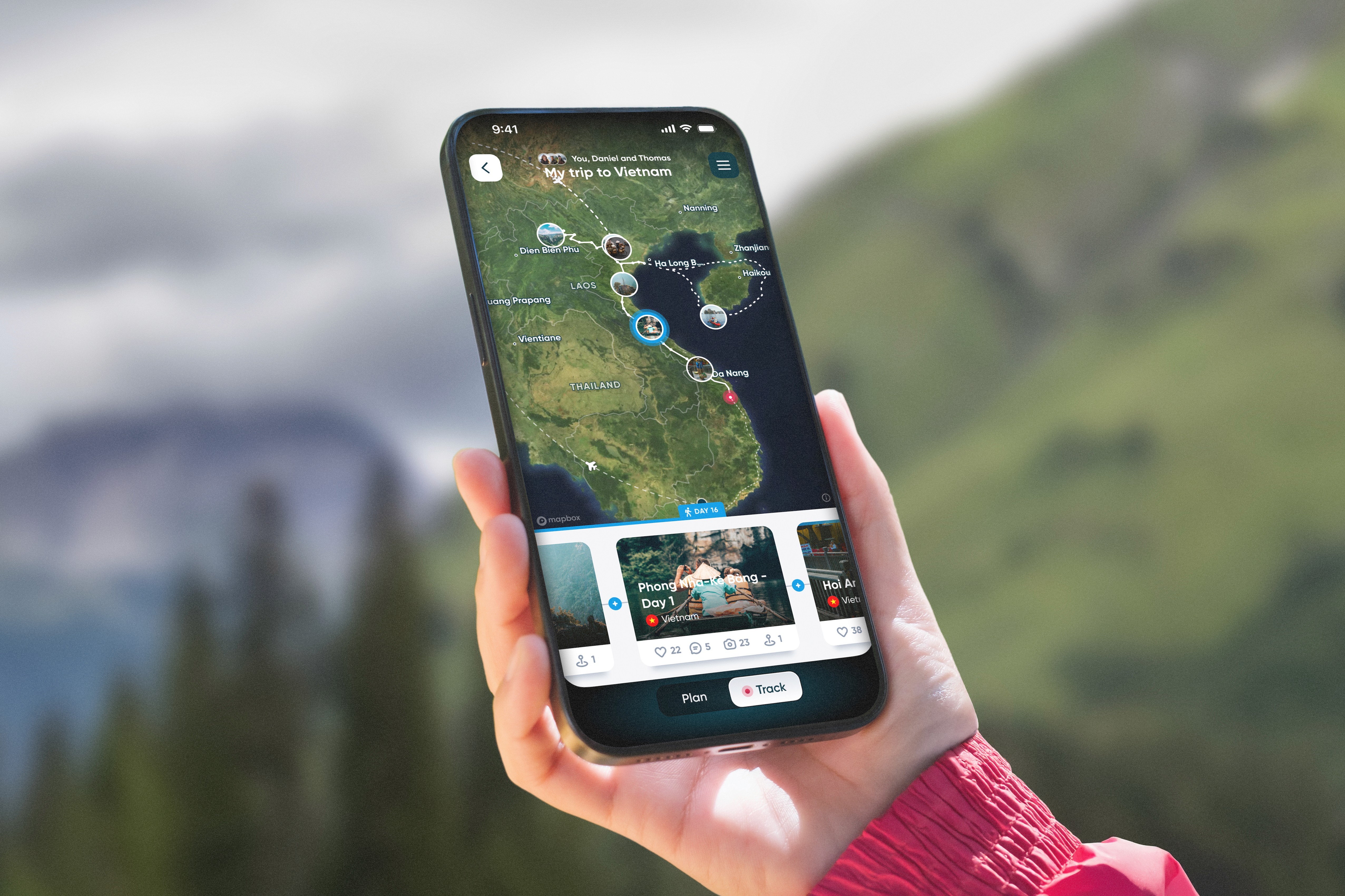 A person holding a phone showing a Polarsteps trip map through Vietnam, with the screen displaying travel Steps and a trip overview.