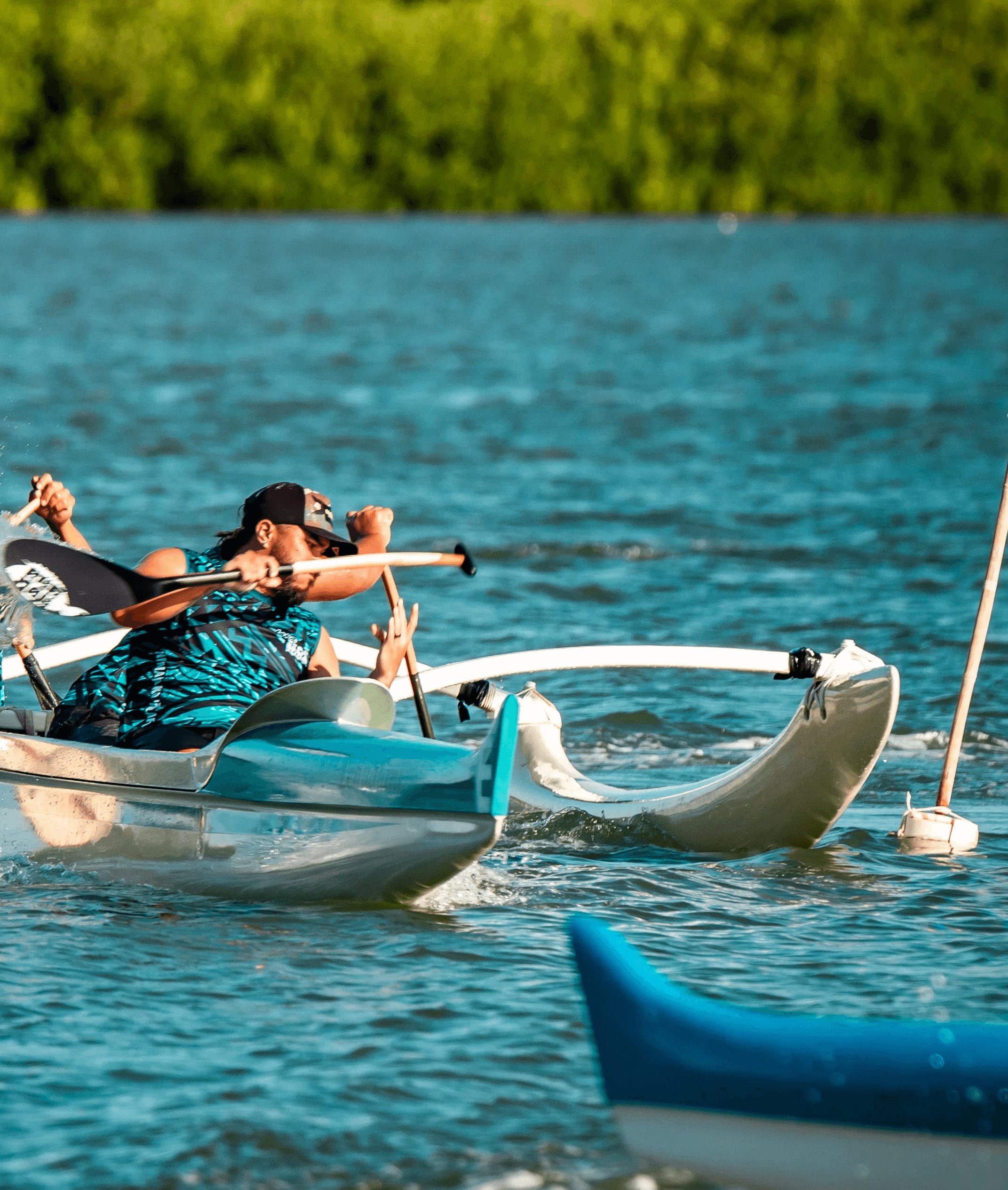 Man with surfing with paddle