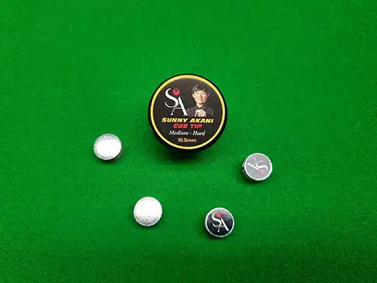 4 sunny akani medium hard tips on a snooker table