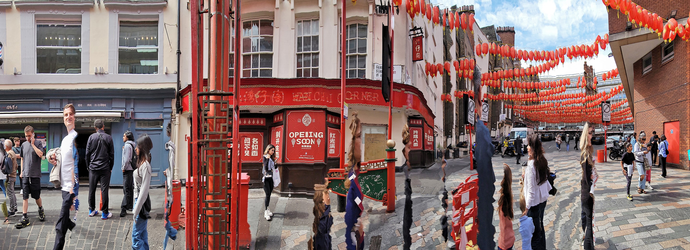 Panoramic photograph of a Chinatown street lined with red lanterns and traditional architecture. Pedestrians walk through the distorted scene, their figures elongated and fragmented, blending everyday movement with rhythmic visual abstraction.
