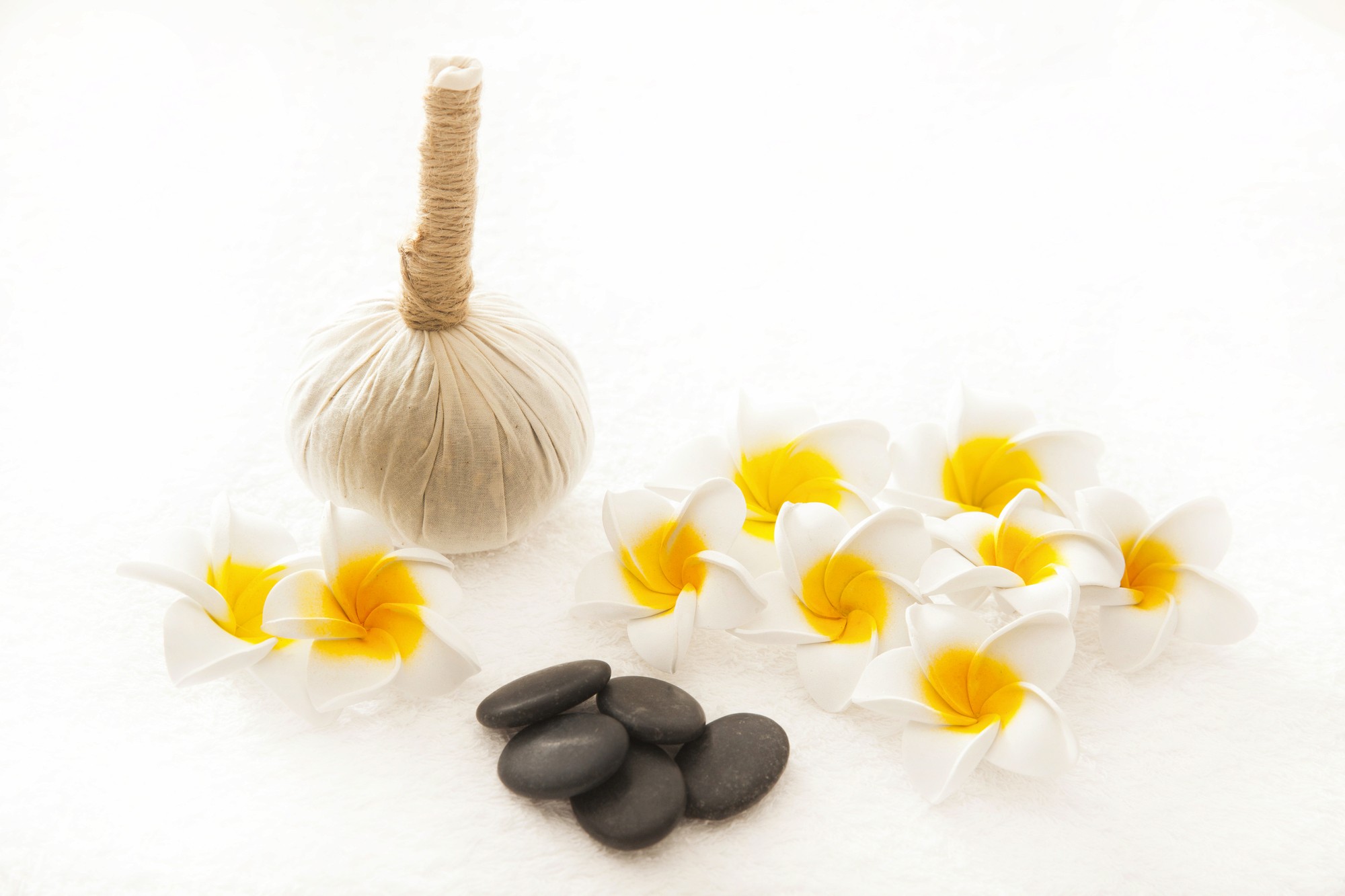 brown wooden beach lounge chair on beach during daytime