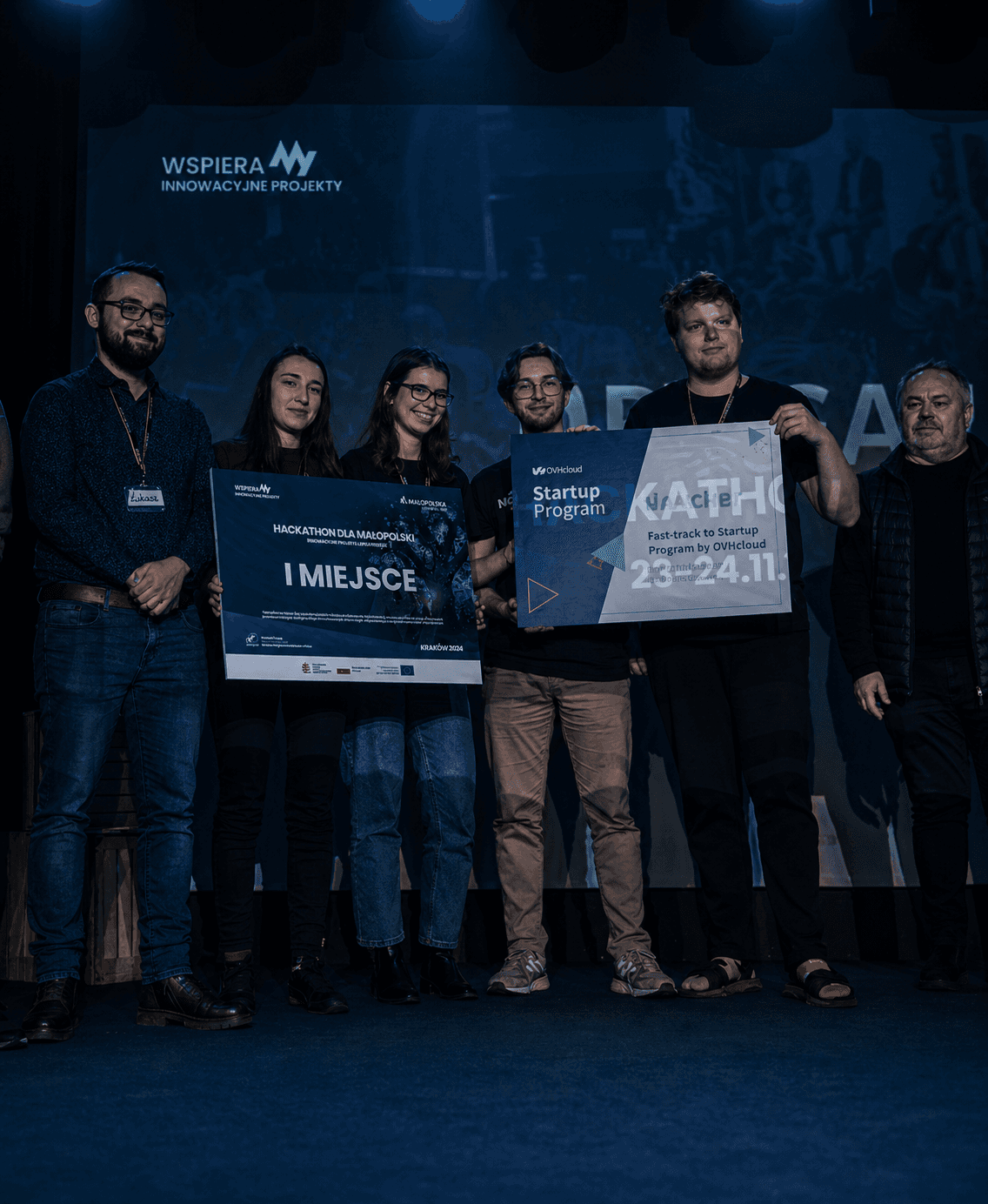 a man holding a microphone in his hands