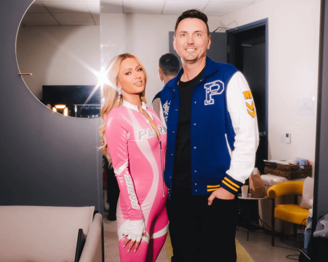 Native Foreign members in front of Bogata Sign