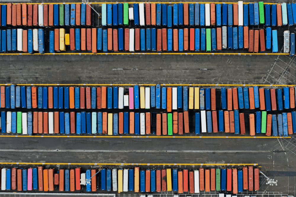 rows of shipping container in at a storage dock