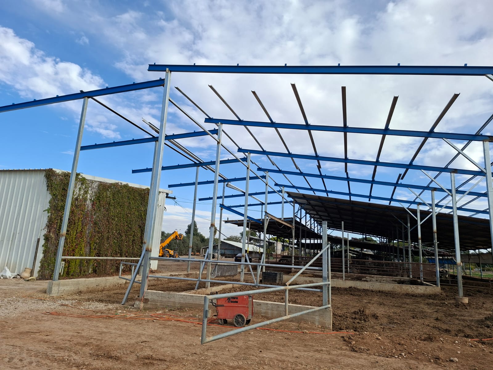 Modern bathroom featuring wooden cabinetry, a bathtub, a sleek sink, and natural light from a window.