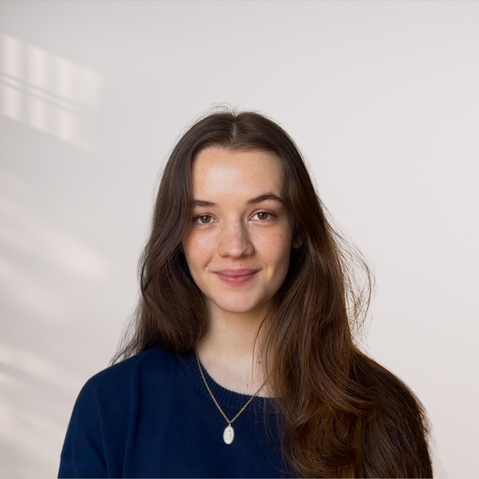 A young girl smiling