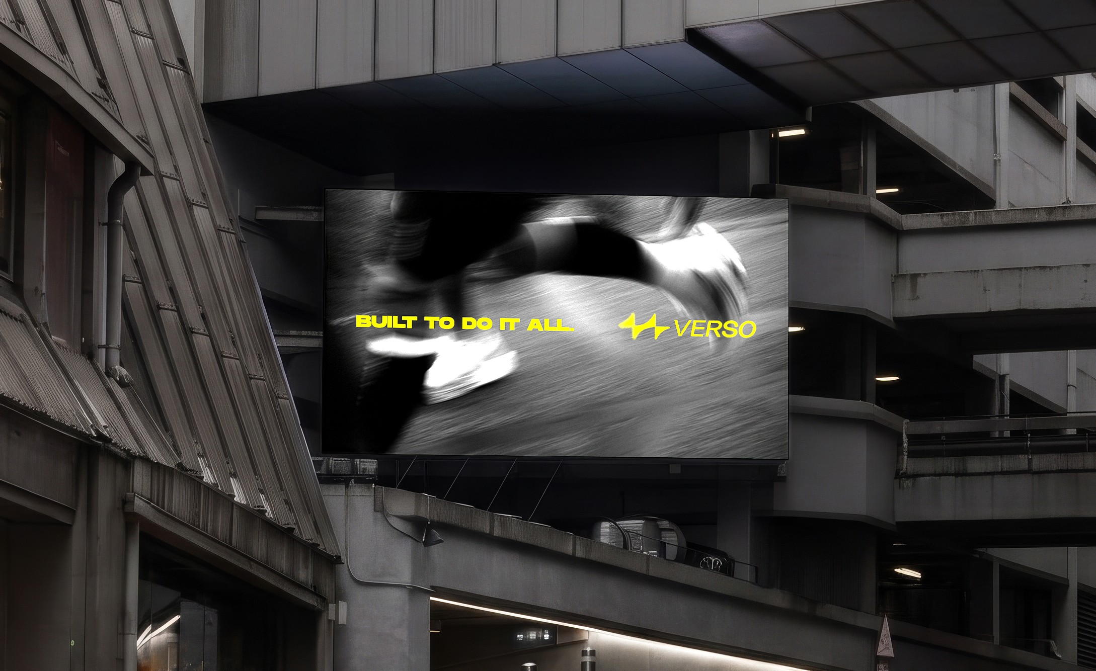 A man jumping in the air near a building