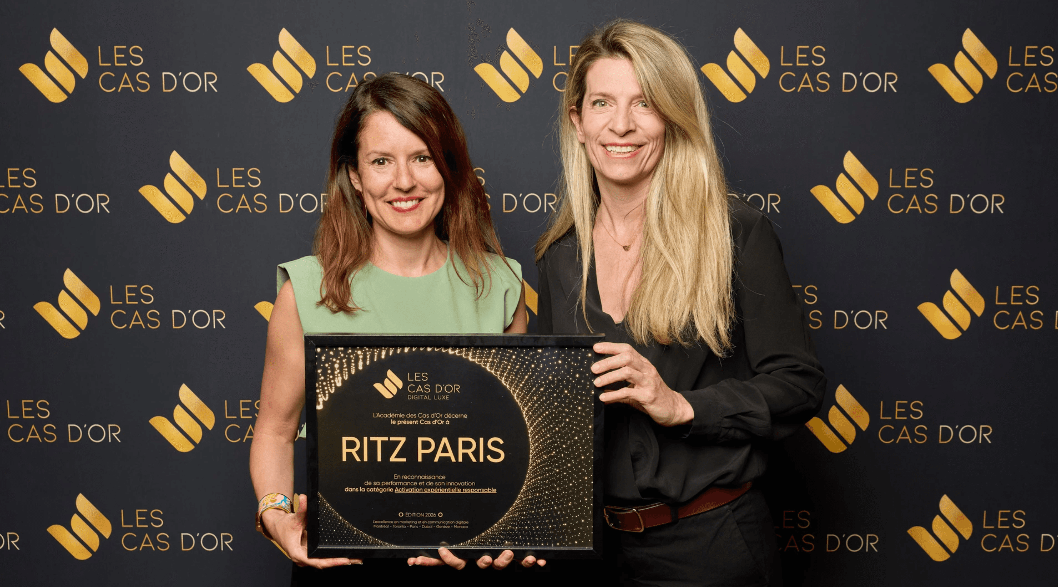 A person in business attire lies amidst scattered papers and folders on a red carpet, holding a phone receiver. The scene conveys chaos and stress.