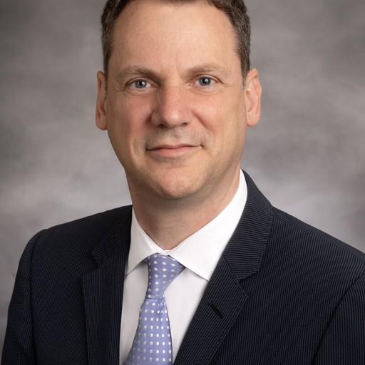 A man smiling for a photo