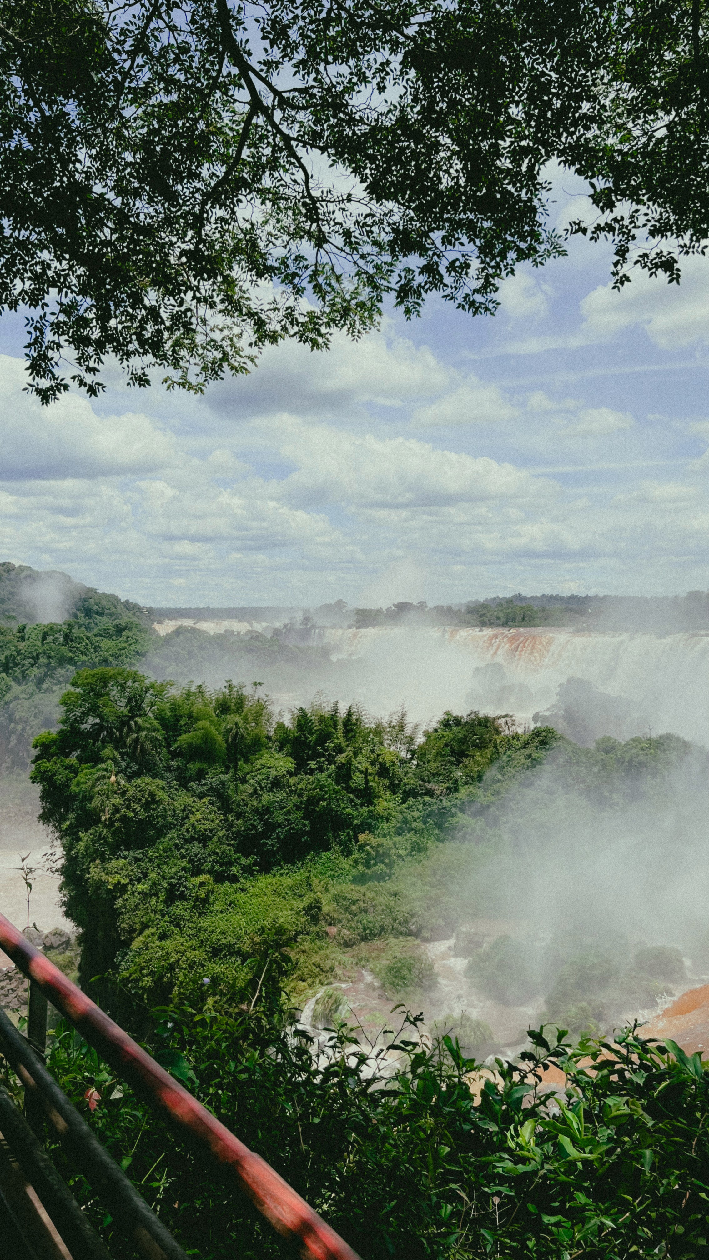 Friends laughing and posing inside a car