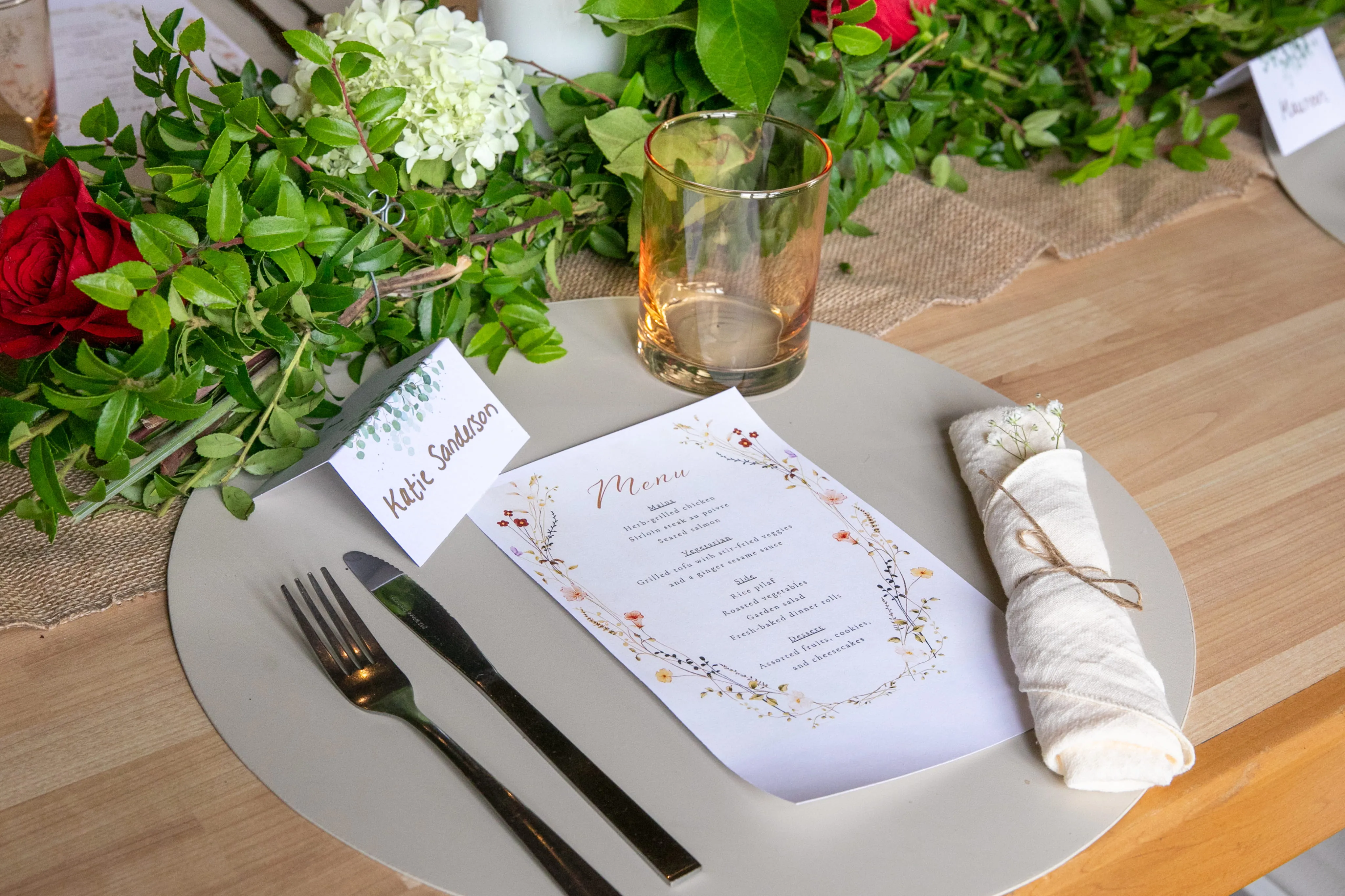 Table place setting with a menu card for an event at Camp Lenox
