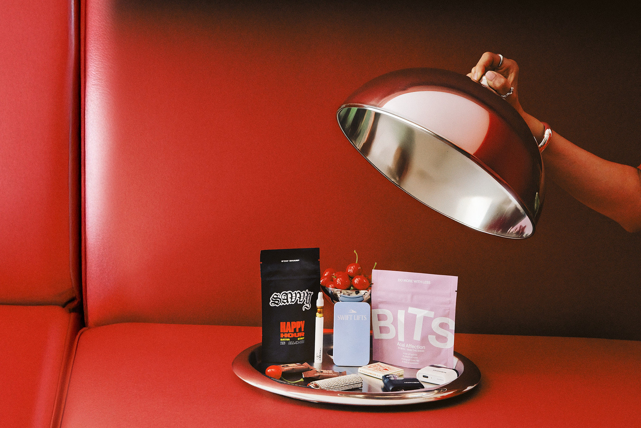 Athletes resting on a blue running track.