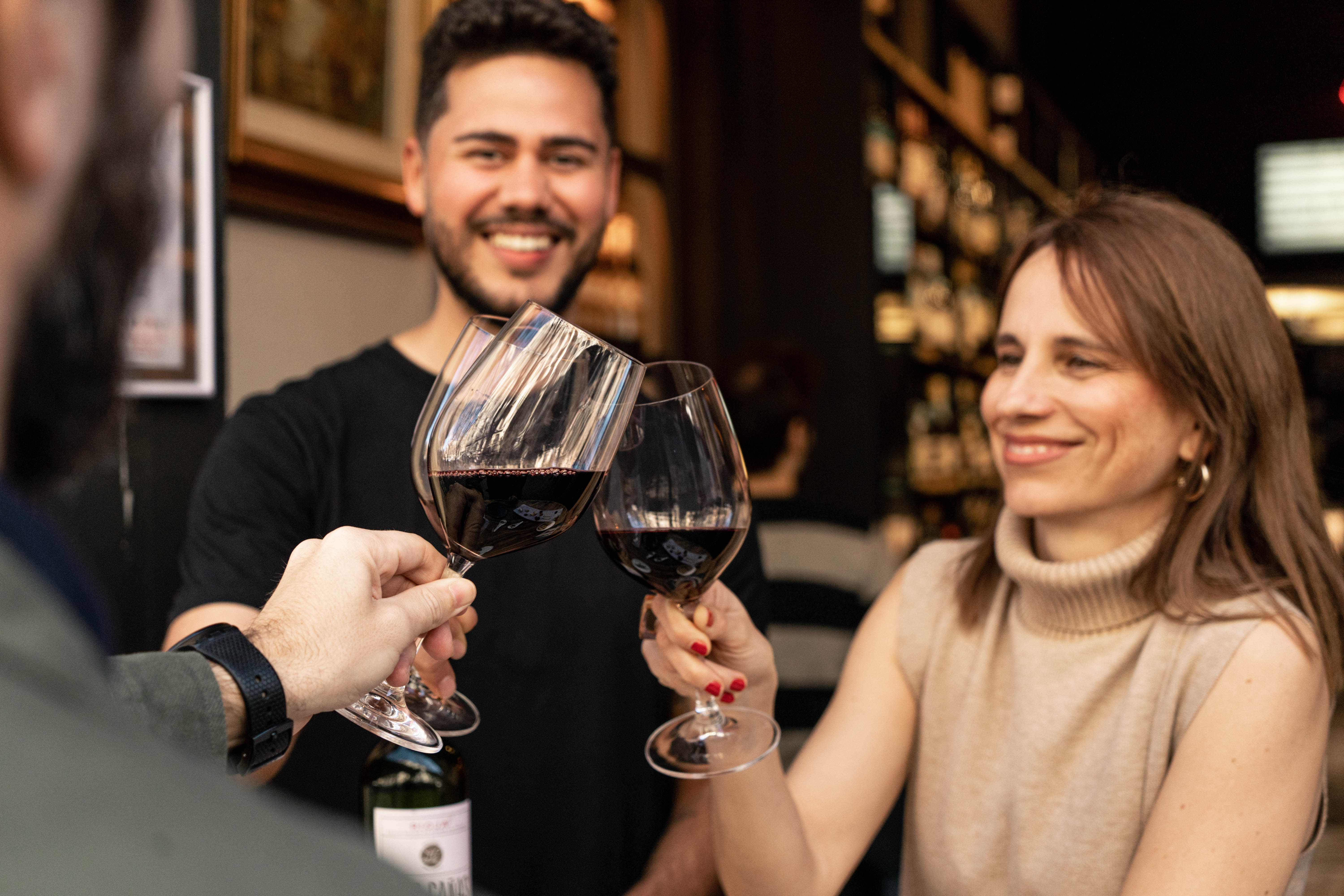 Sommelier leading guests in a wine tasting during a small-group Barcelona food and wine tour.