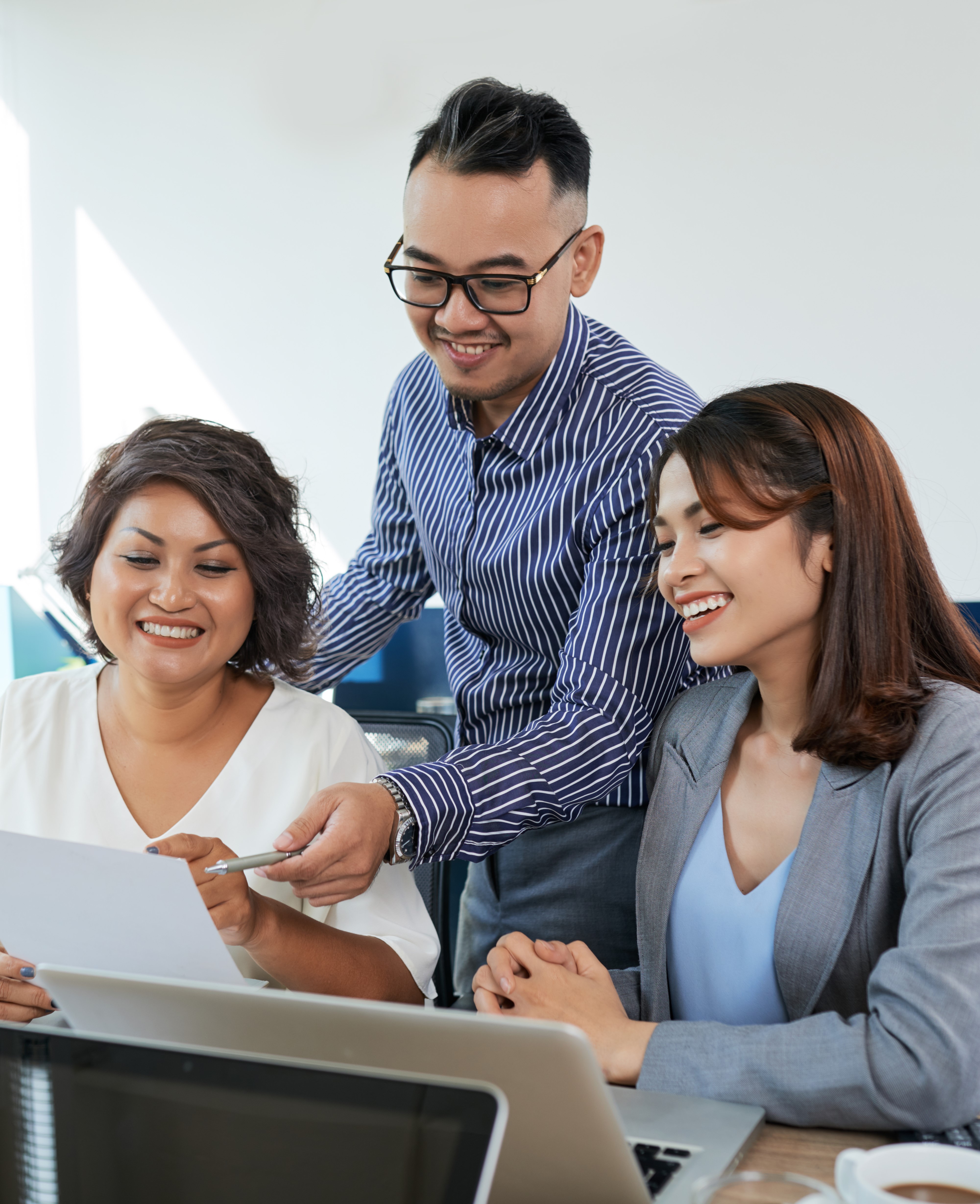 Two women laughing at work