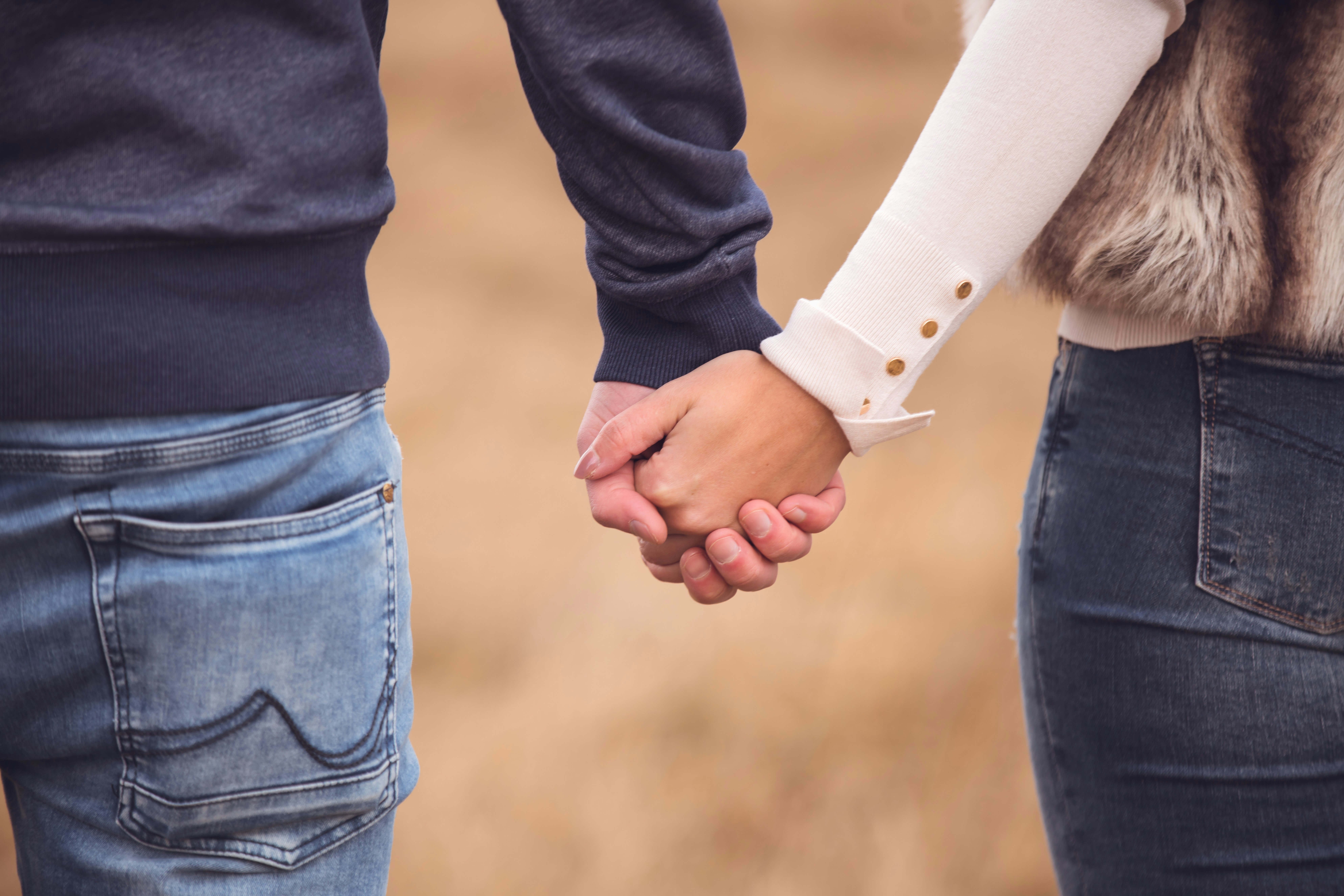 couple taking hands