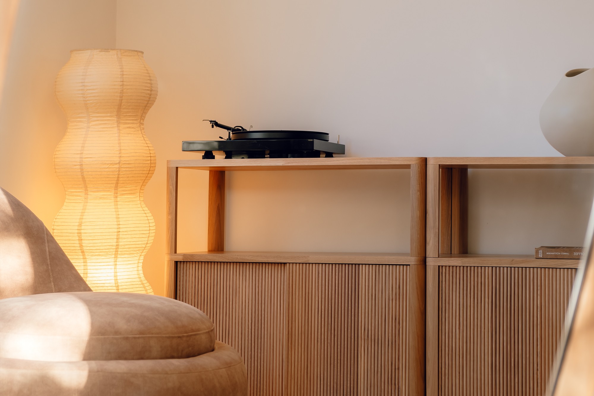 Bride in white dress walking on street, blurred motorcycle passing