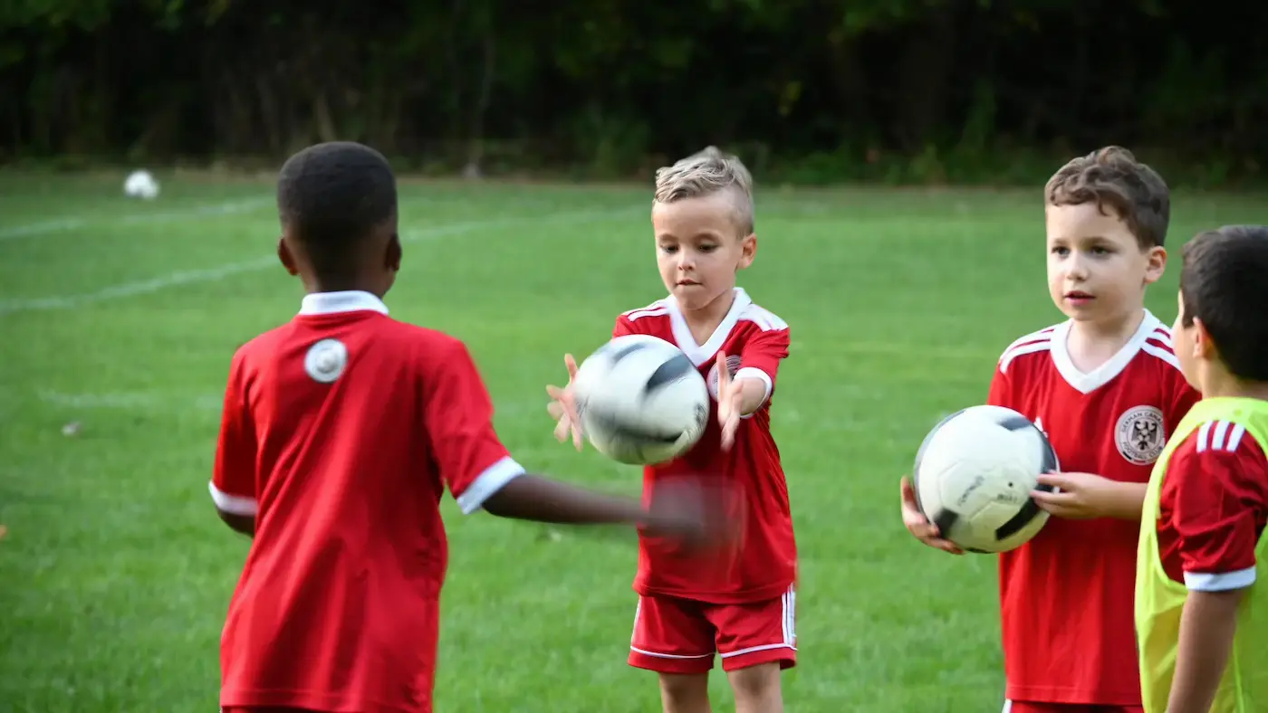 white and black ball on white metal frame
