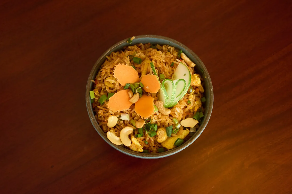 Bowl of fried rice with vegetables at Jun Restaurant