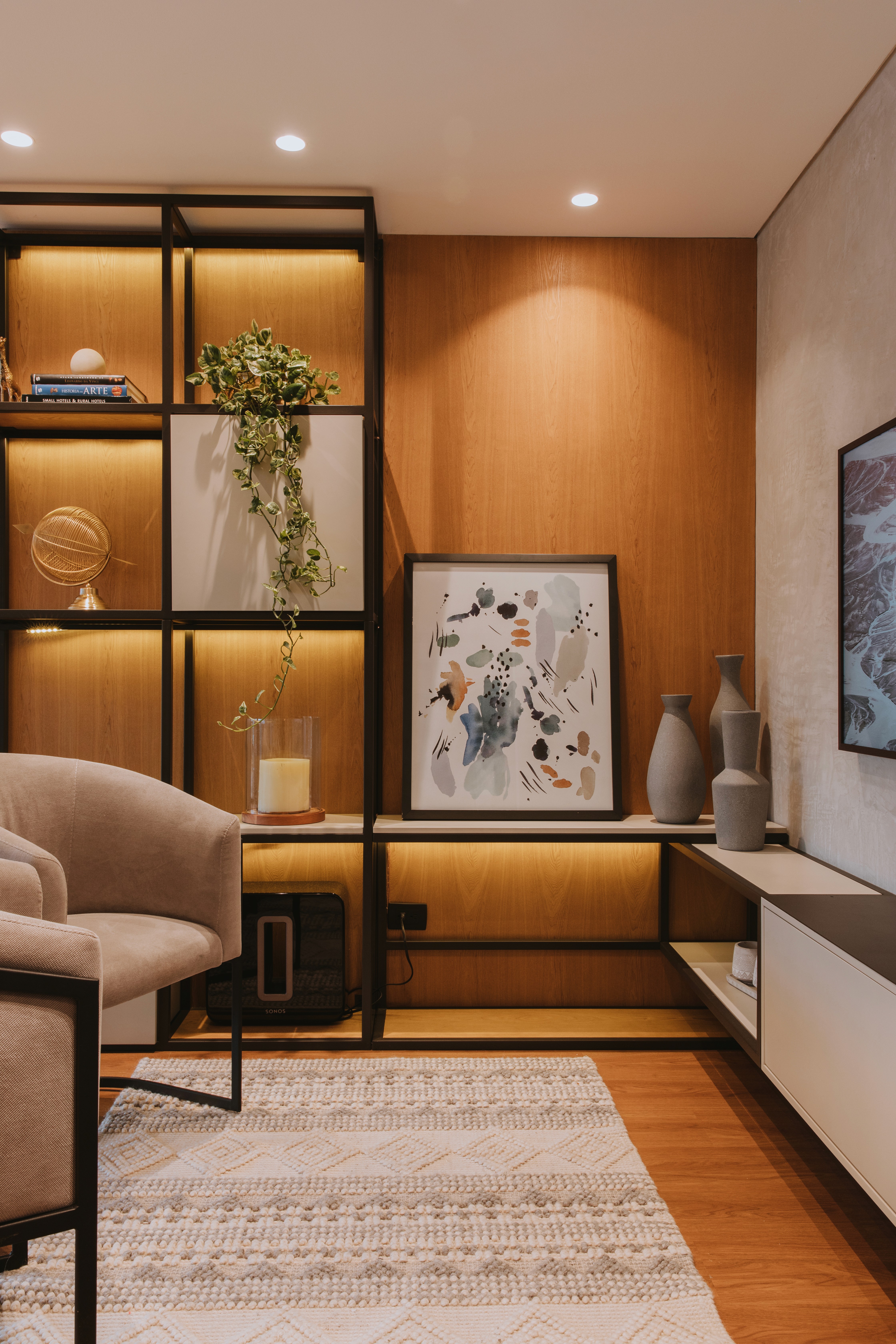 Double-height interior with flowing sculptural forms and warm raking light