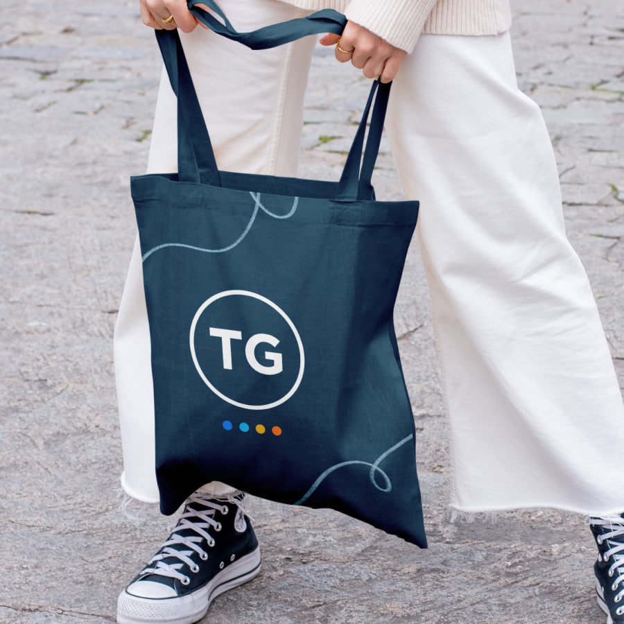 Tote bag with the Towbes Group logo.