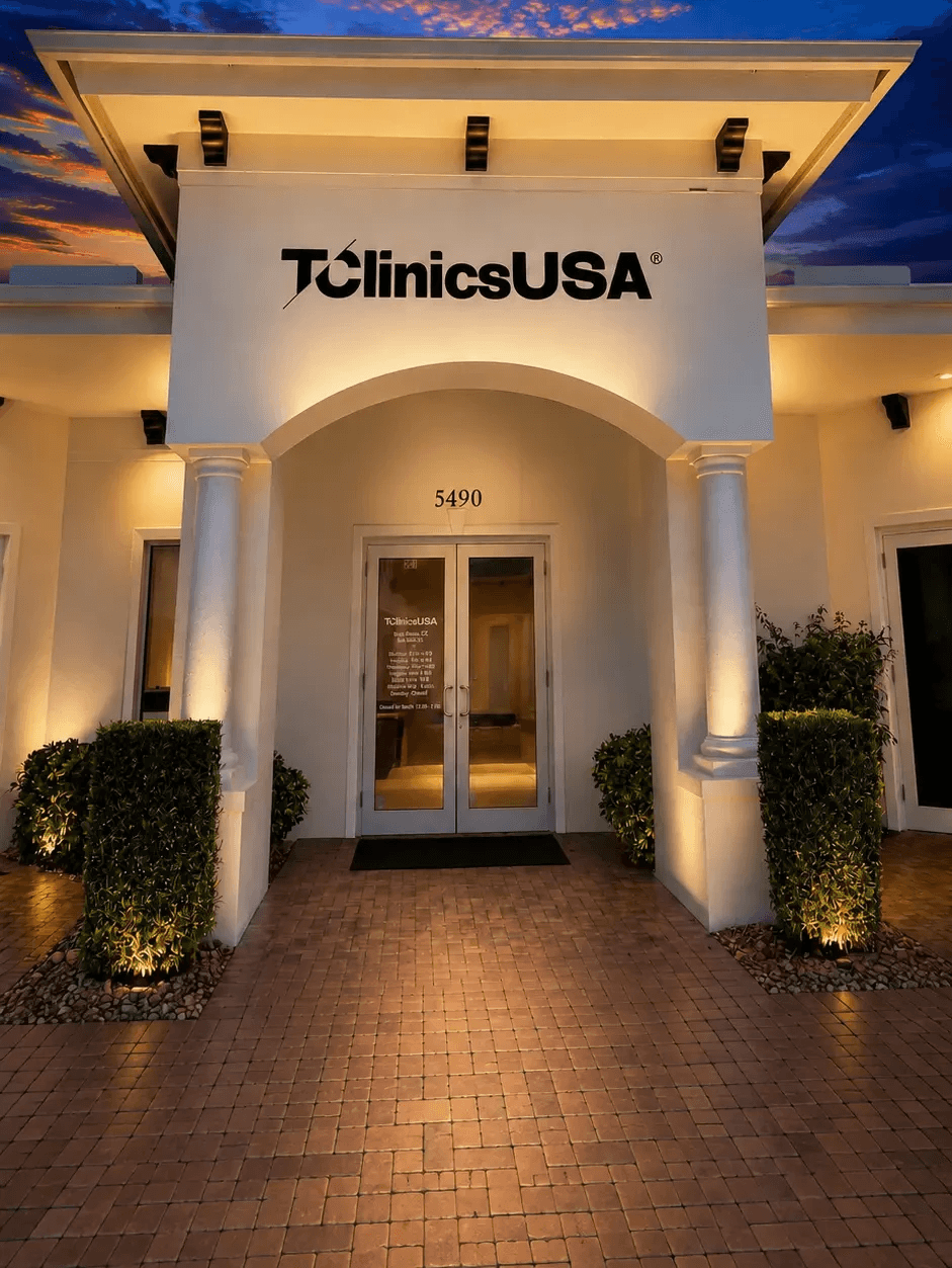 T Clinics USA clinic entrance illuminated at dusk