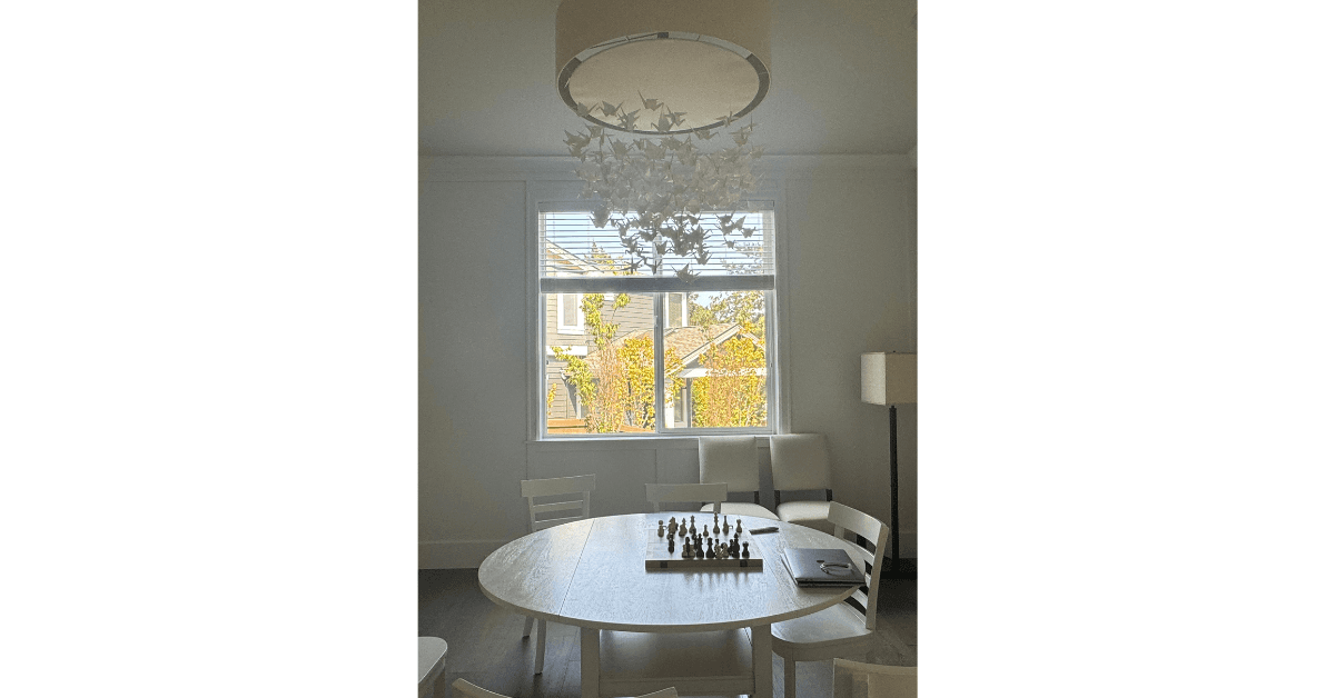 We're excited to share details from The Norkirk House: Dining Room — one of our favorite interior design + professional organizing projects in Kirkland, Washington. This elegant space serves as the heart of the home for connection, balancing sophisticated design with the practical needs of a growing family. It's a place where they can gather, share meals, and create cherished memories, embodying the comfortable and beautiful home they envisioned.