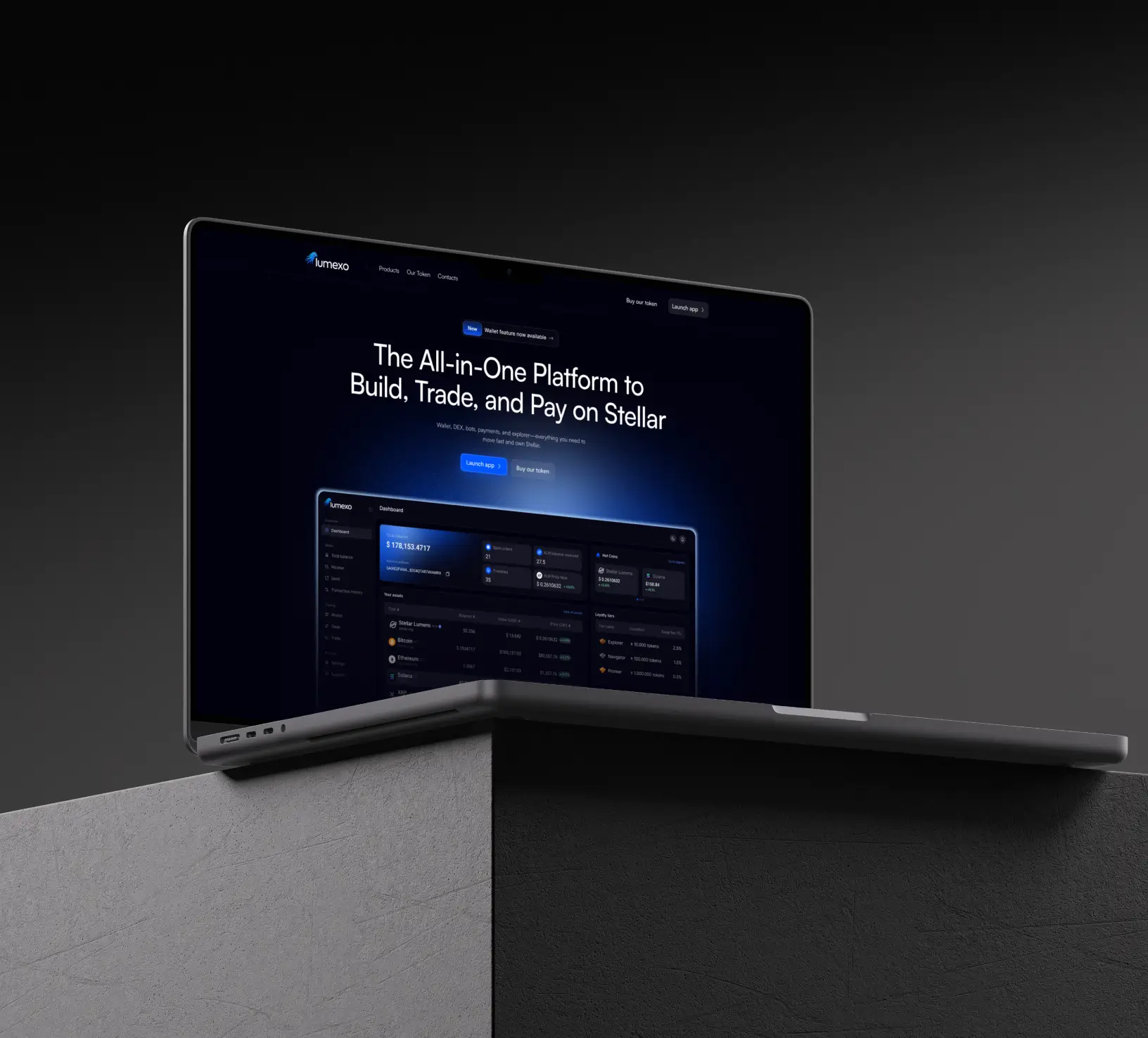 Modern laptop sitting on a cement block