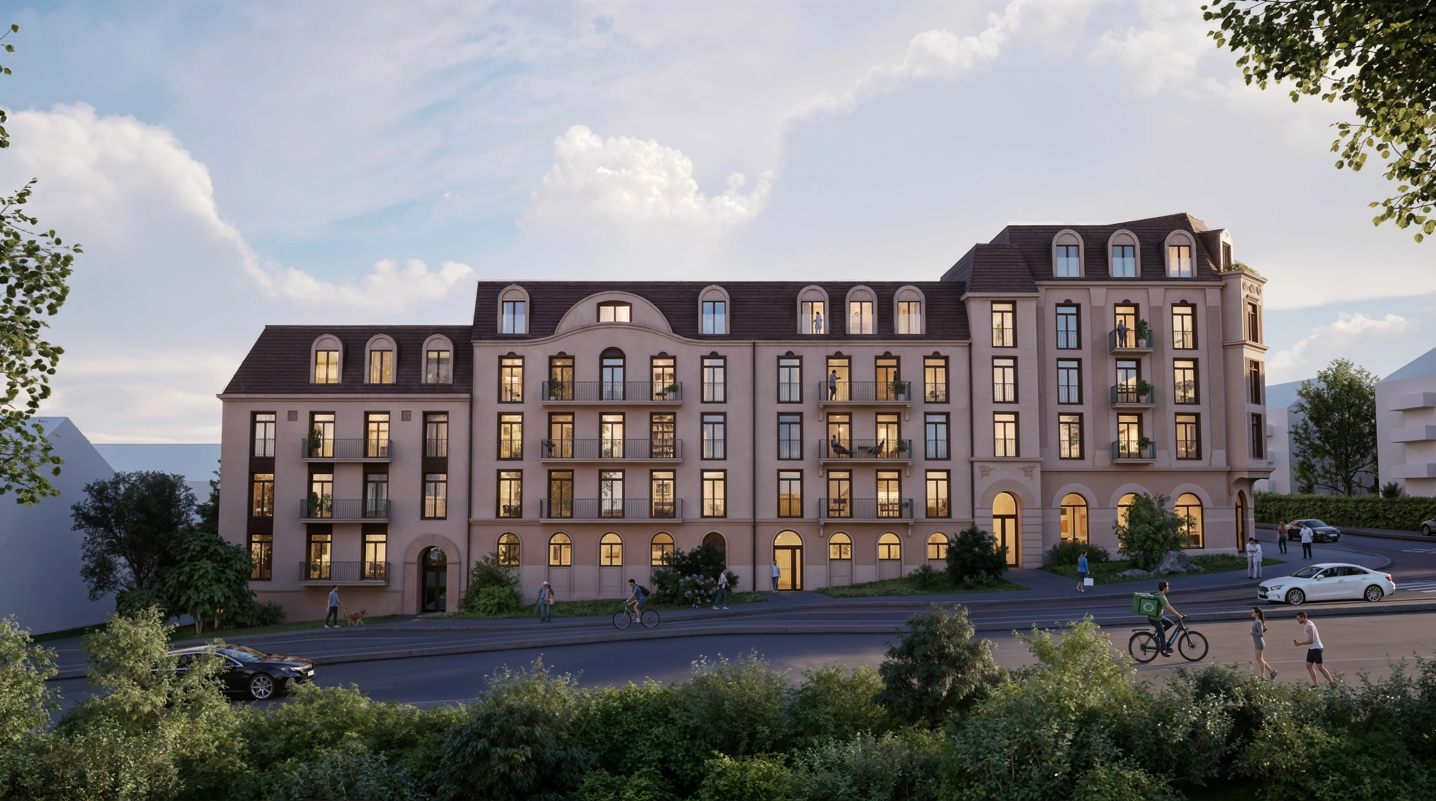 Utsikt over indre gårdsrom i HasleHaven med klassisk bebyggelse og takterrasse i kveldslys